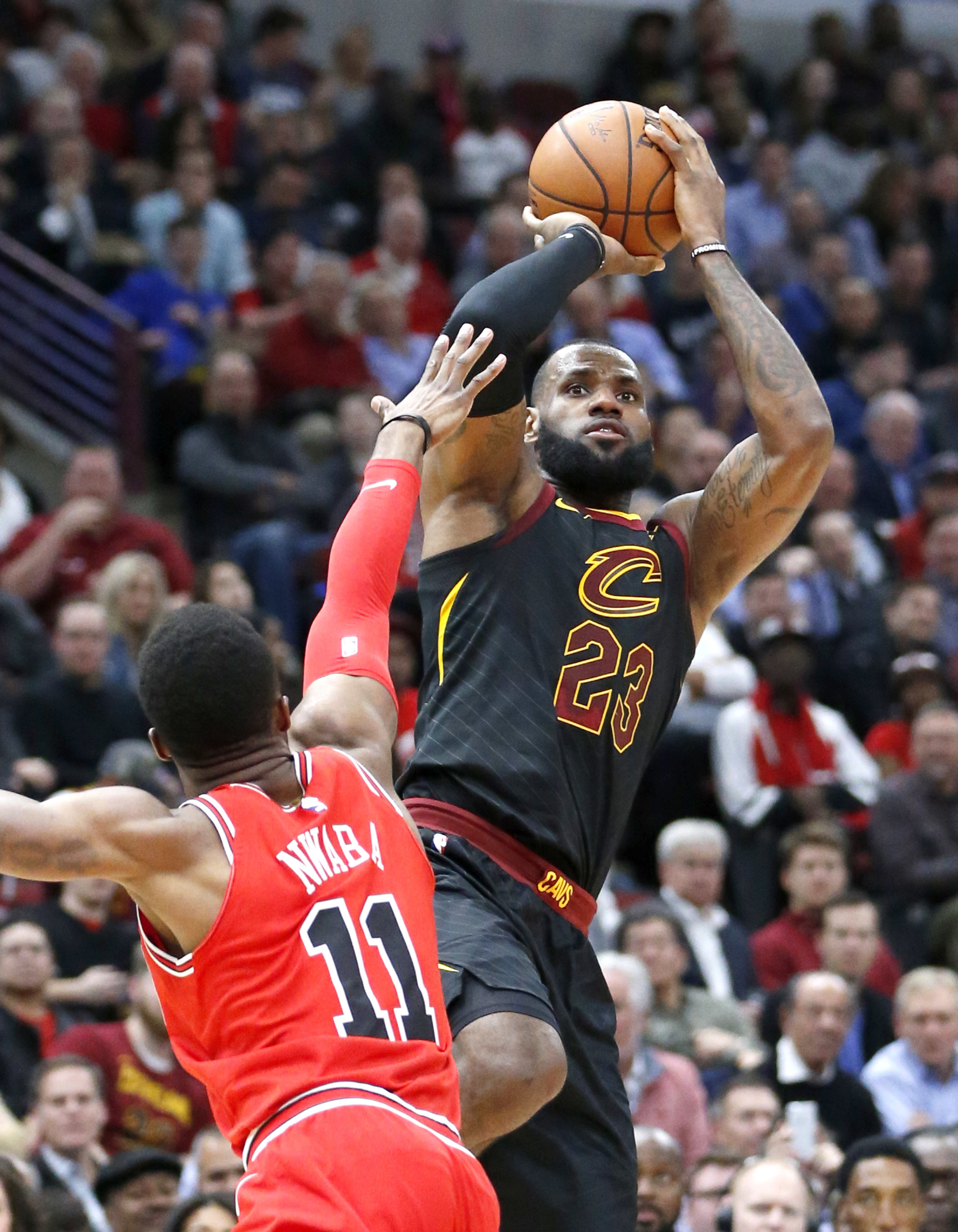 Wade, Love, James lead surging Cavaliers over Bulls 113-91
