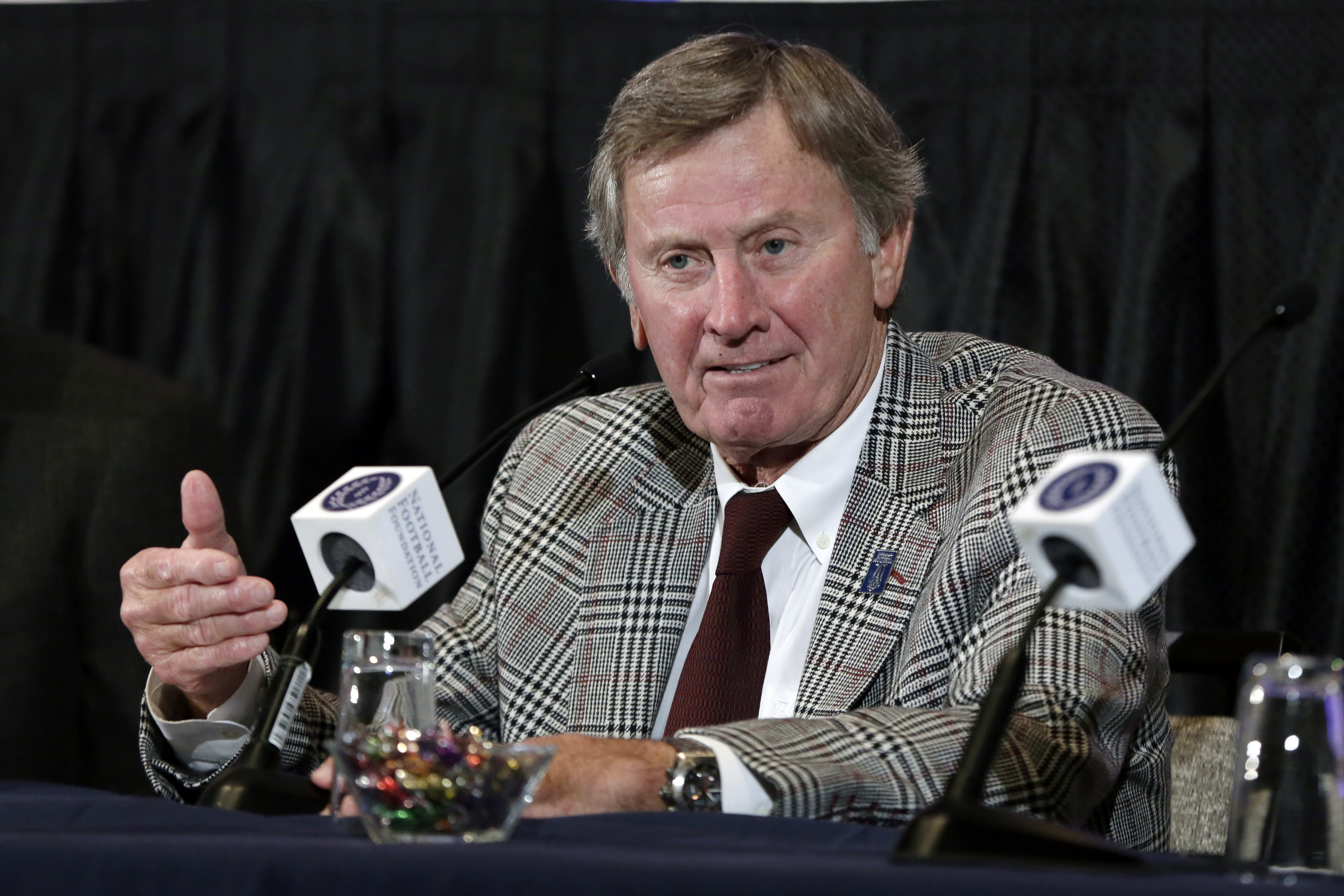 Rivals Manning, Spurrier enter College Hall of Fame together