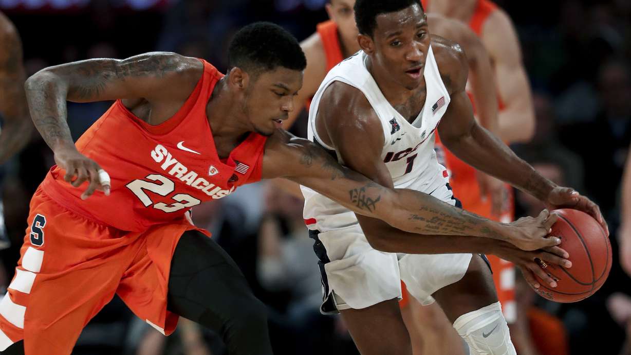 Brissett's double-double lifts Syracuse past UConn 72-63