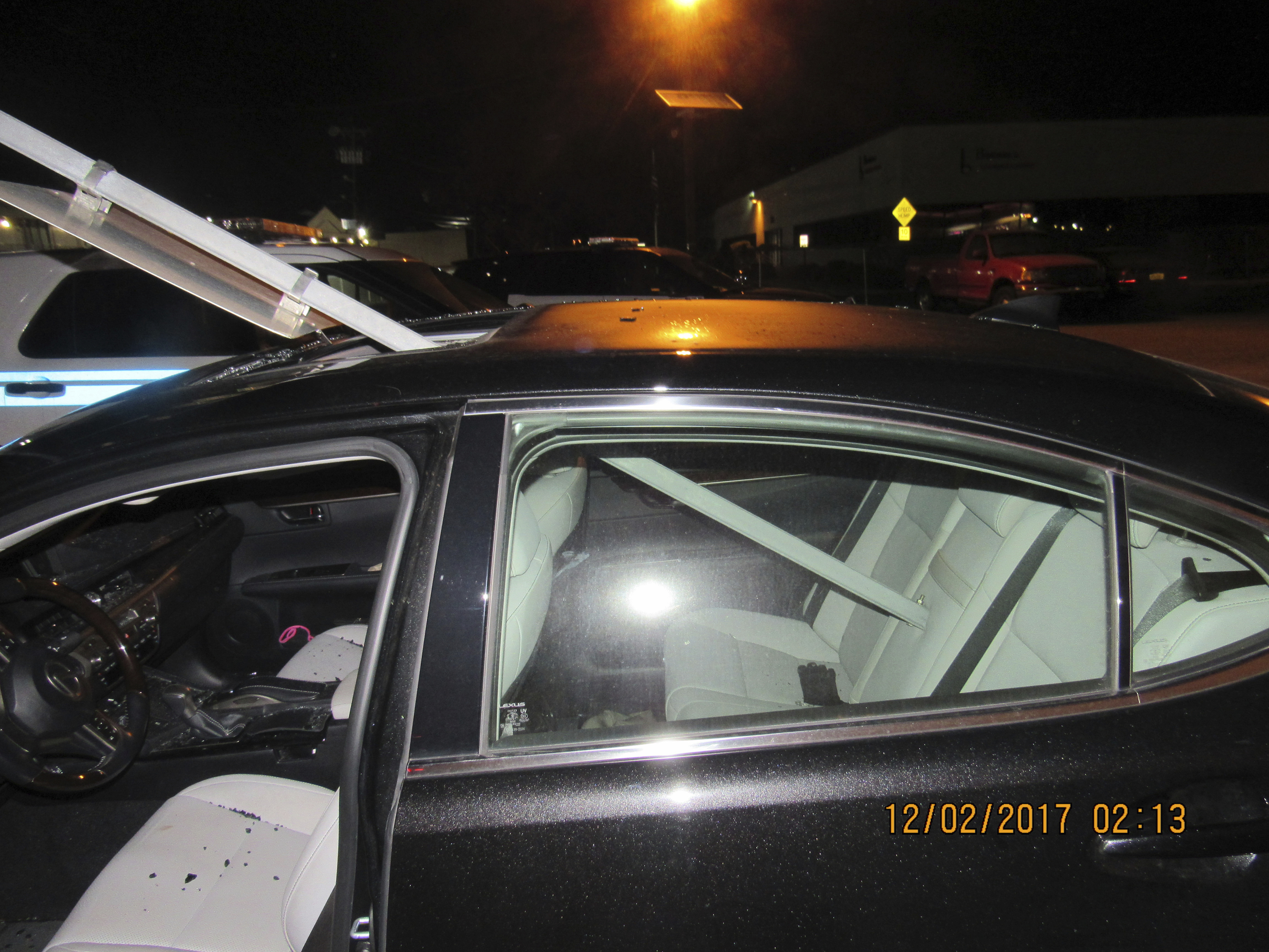 Police: Woman drove with transit sign sticking out of car