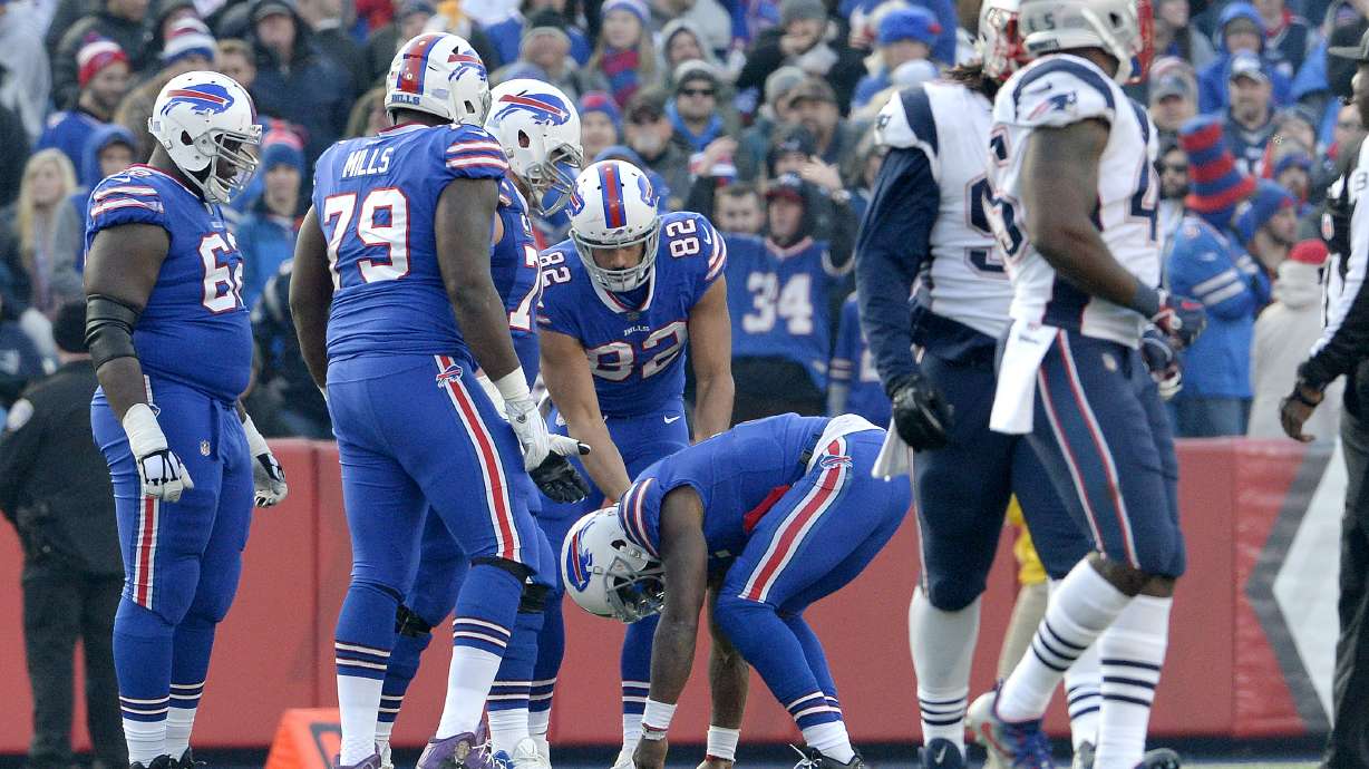 Bills QB Taylor held out of practice due to bruised knee