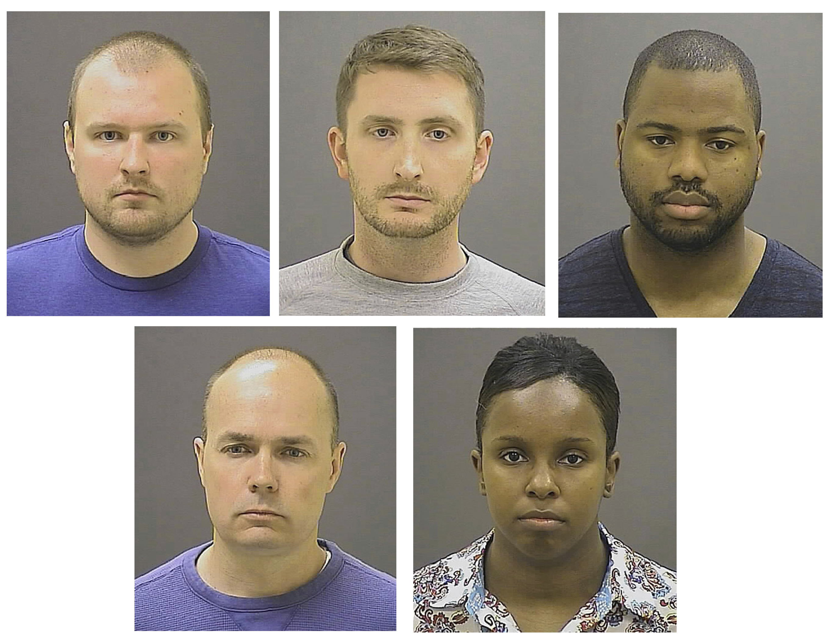 The Latest: Court hears 5 officers' bid to sue a prosecutor
