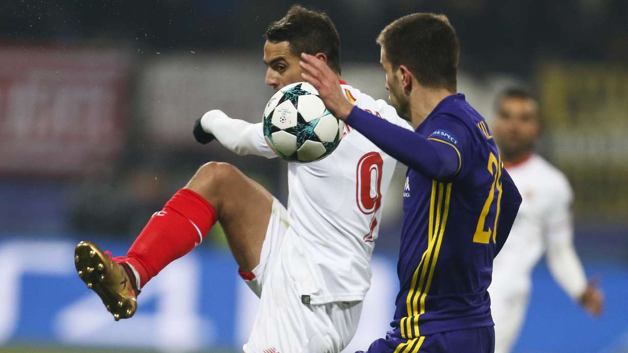 Sevilla draws at Maribor to make last 16 of Champions League
