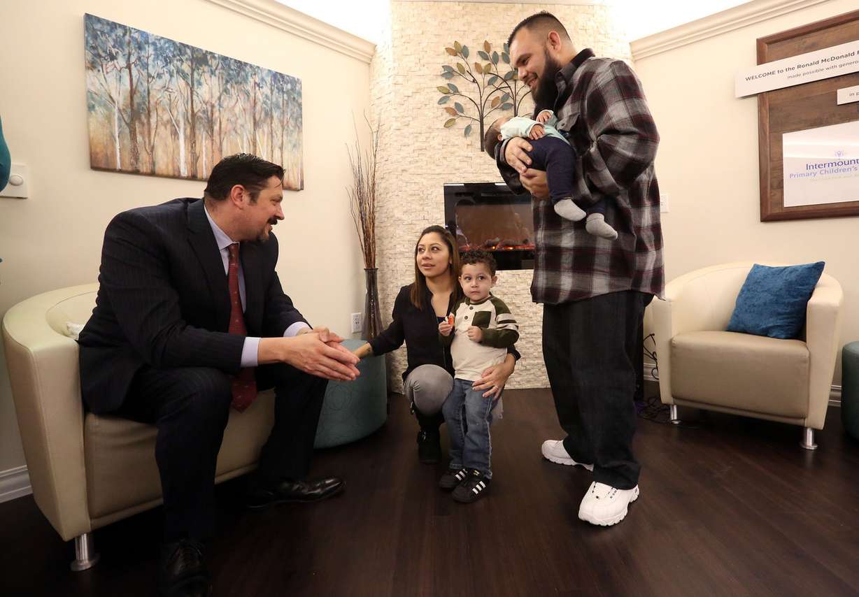 Dr. Manuel Rodriguez, talks to Sonia Martinez, Remmy Martinez, Miah Martinez and Angel Martinez in the second Ronald McDonald Family Room at Primary Children’s Hospital in Salt Lake City on Wednesday, Dec. 6, 2017. Rodriguez was one of the surgeons who performed a liver transplant on Remmy, 2, to treat biliary atresia. The second Ronald McDonald Family Room serves the families of patients in the pediatric intensive care unit, cardiac ICU and neuro trauma unit. (Photo: Kristin Murphy, KSL)