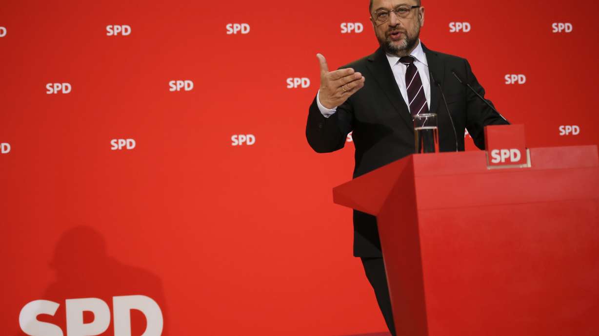 Germany's Social Democrats OK talks on a new Merkel govt