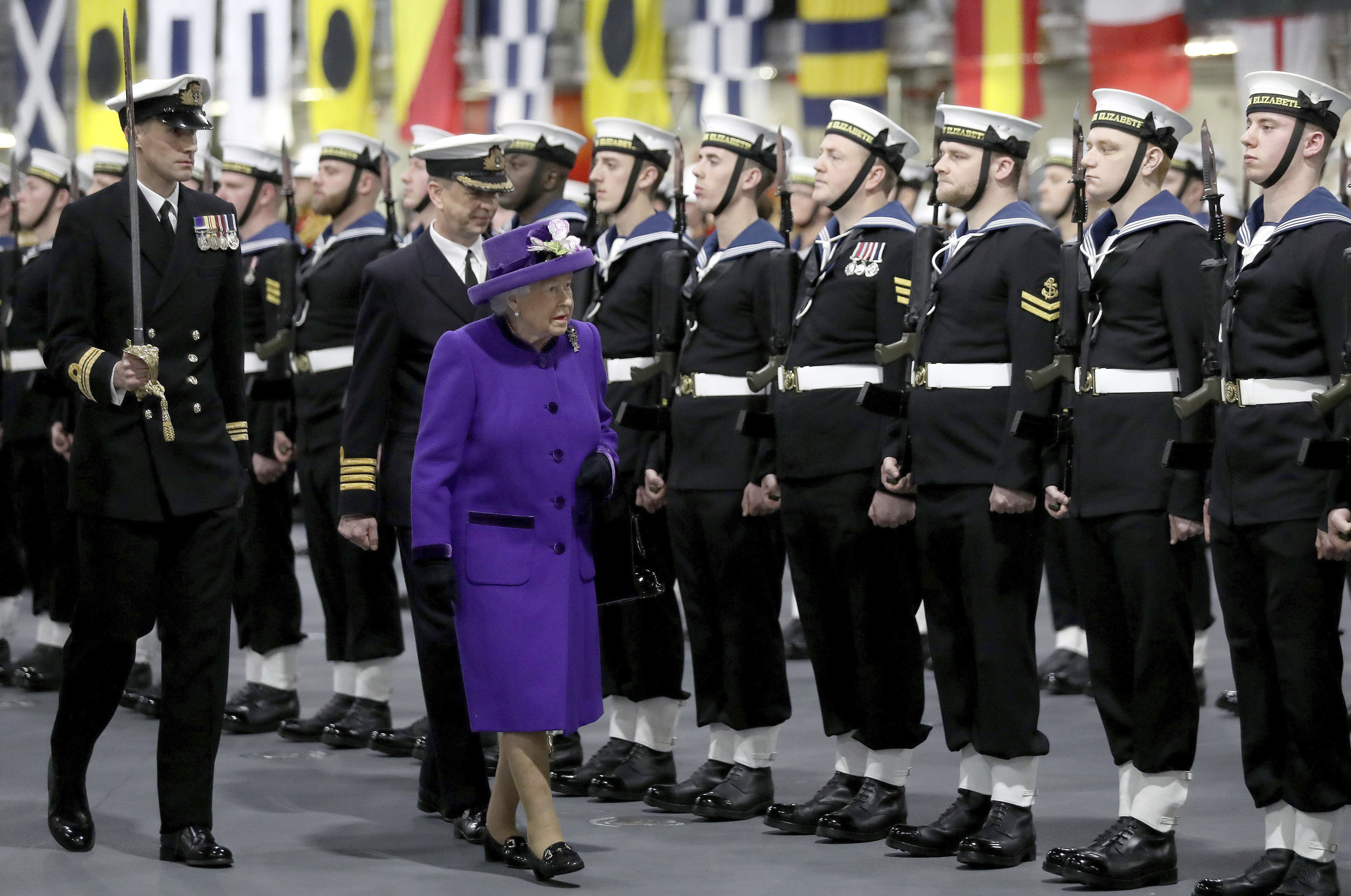 Queen Elizabeth commissions aircraft carrier with her name