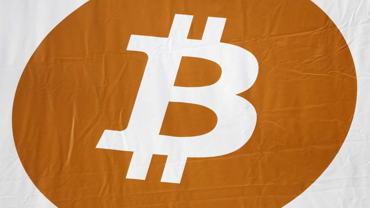 Bitcoin soars then falls back; banks raise risk concerns