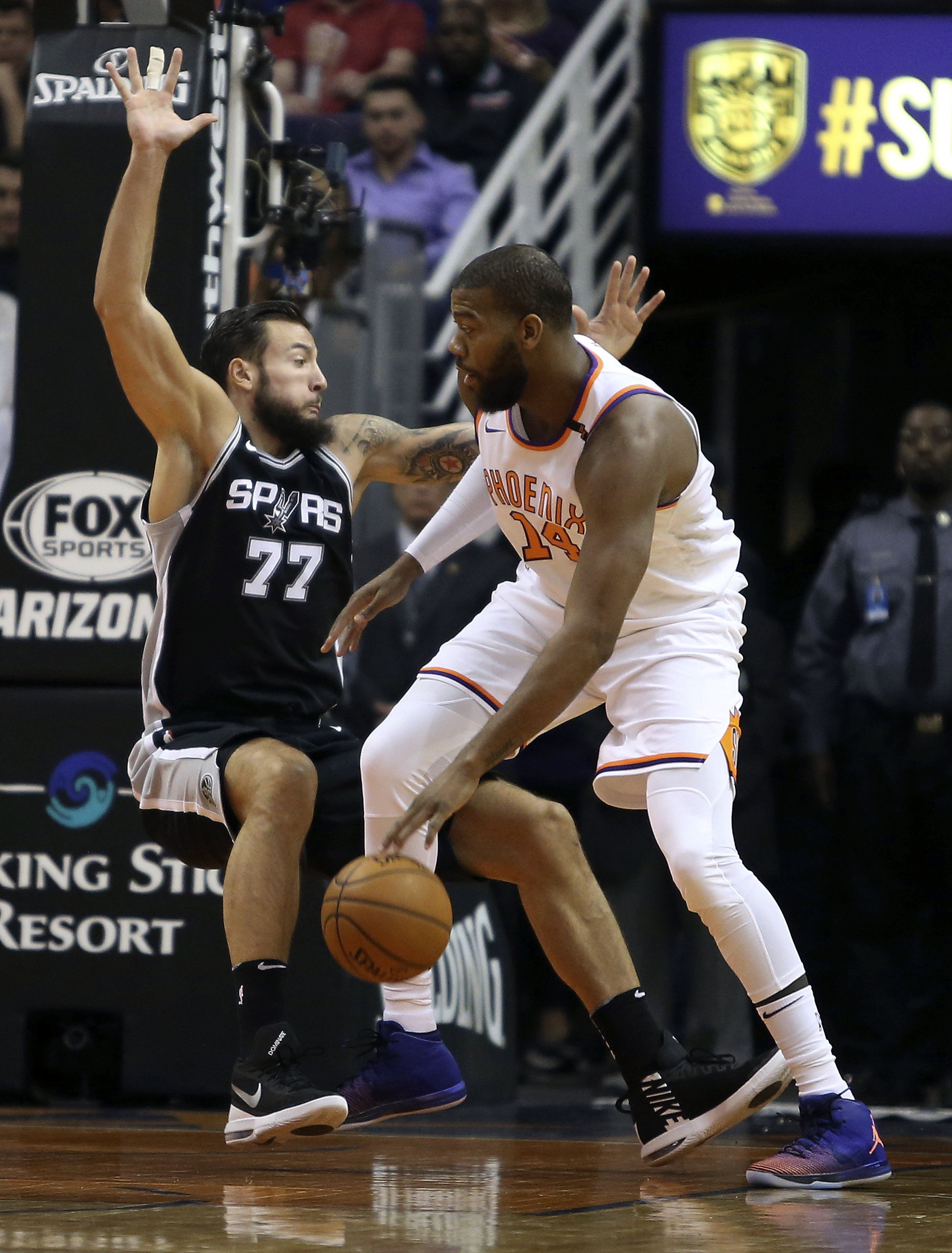 Depleted Spurs beat Suns for 8th win in 9 games
