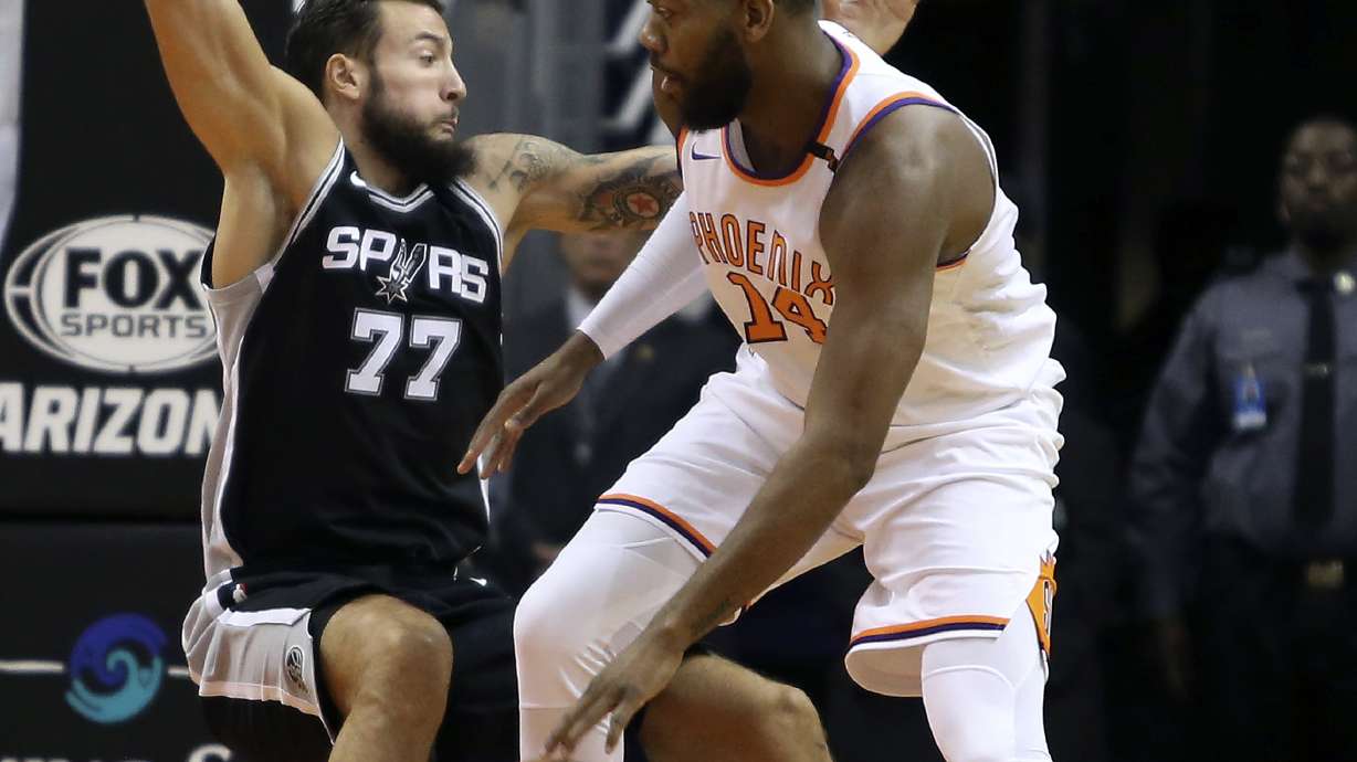 Depleted Spurs beat Suns for 8th win in 9 games