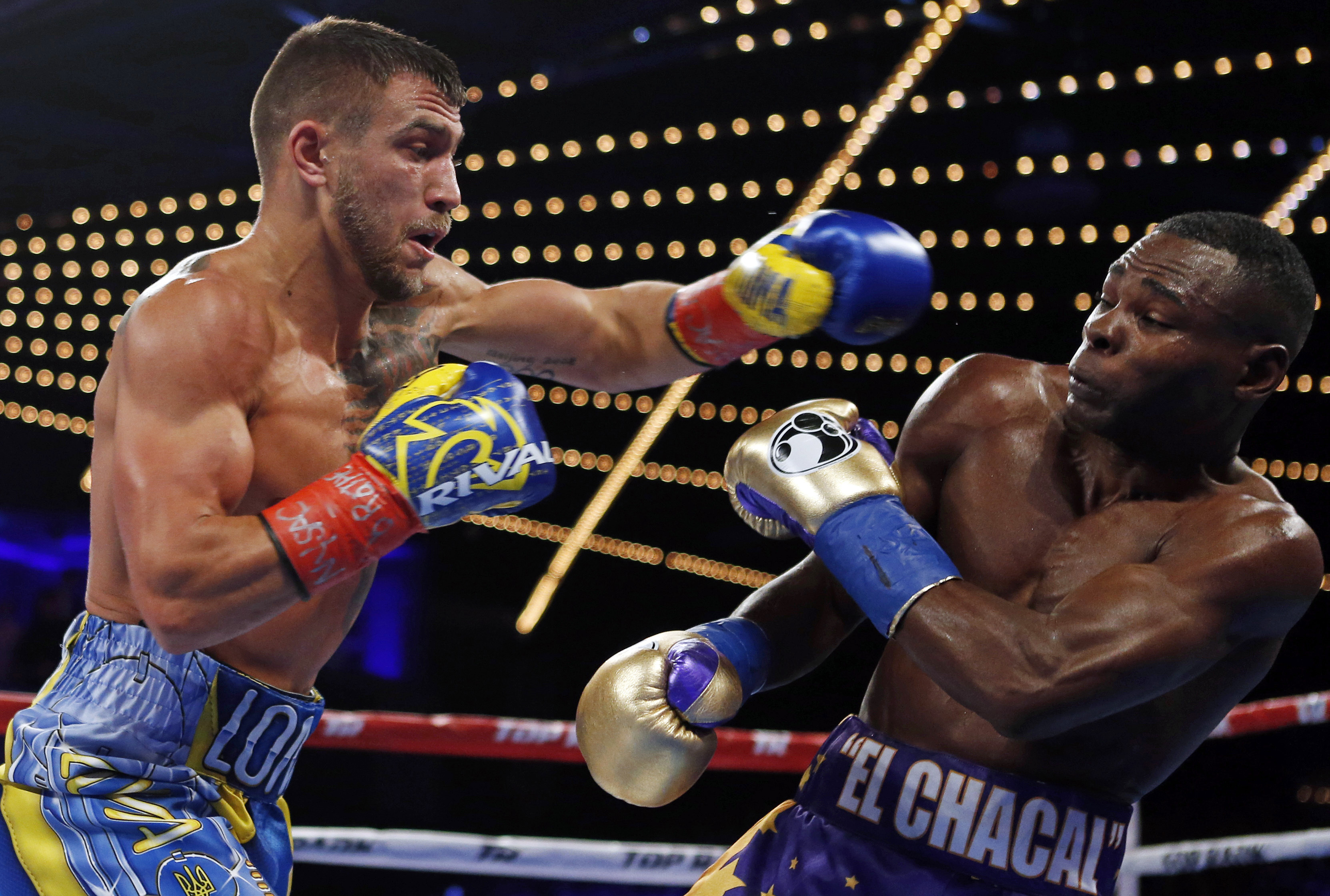 Lomachenko stops Rigondeaux to win match of Olympic greats