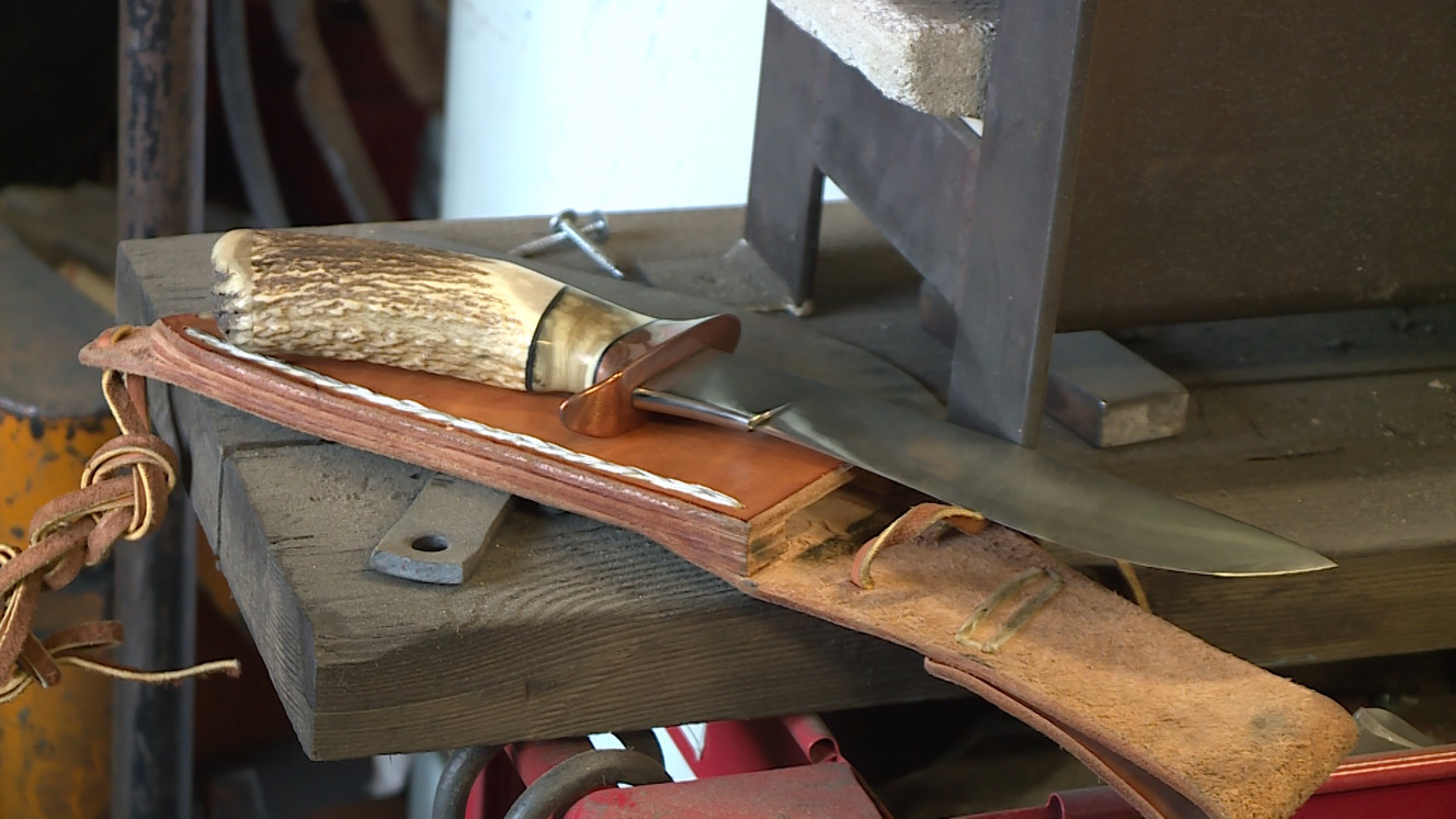 One of Jared Williams' finished knives sits in his shop in South Salt Lake on Tuesday, Dec. 5, 2017. (Photo: Ray Boone, KSL TV)