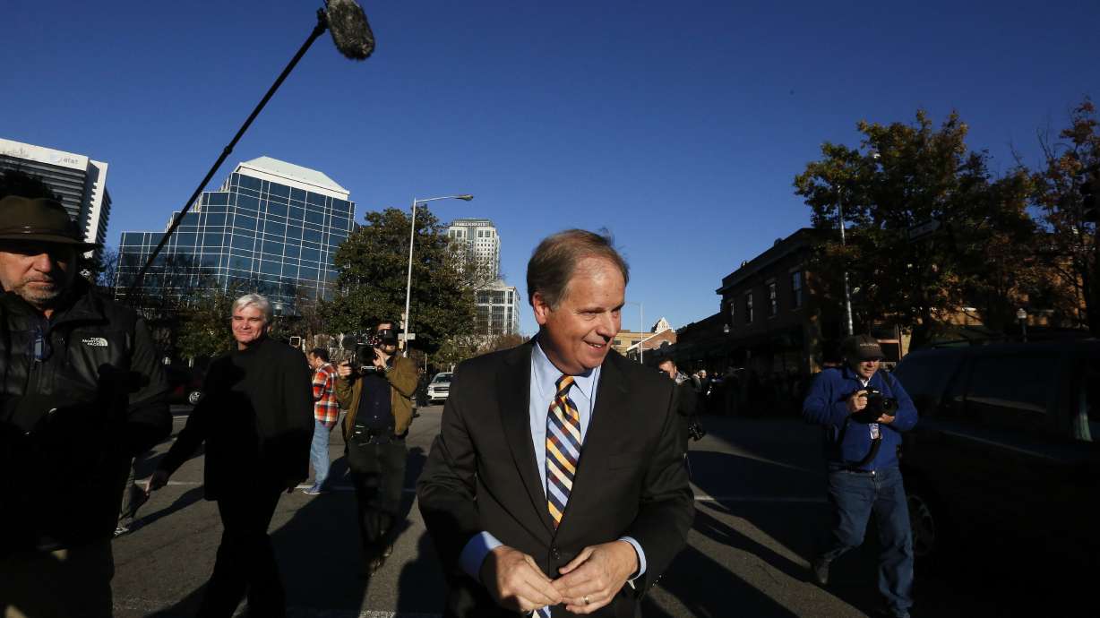 The Latest: Moore's wife: 'One of our attorneys is a Jew'