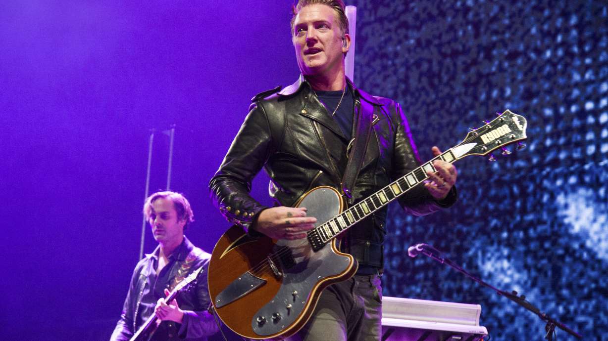 Josh Homme apologizes again for kicking photographer