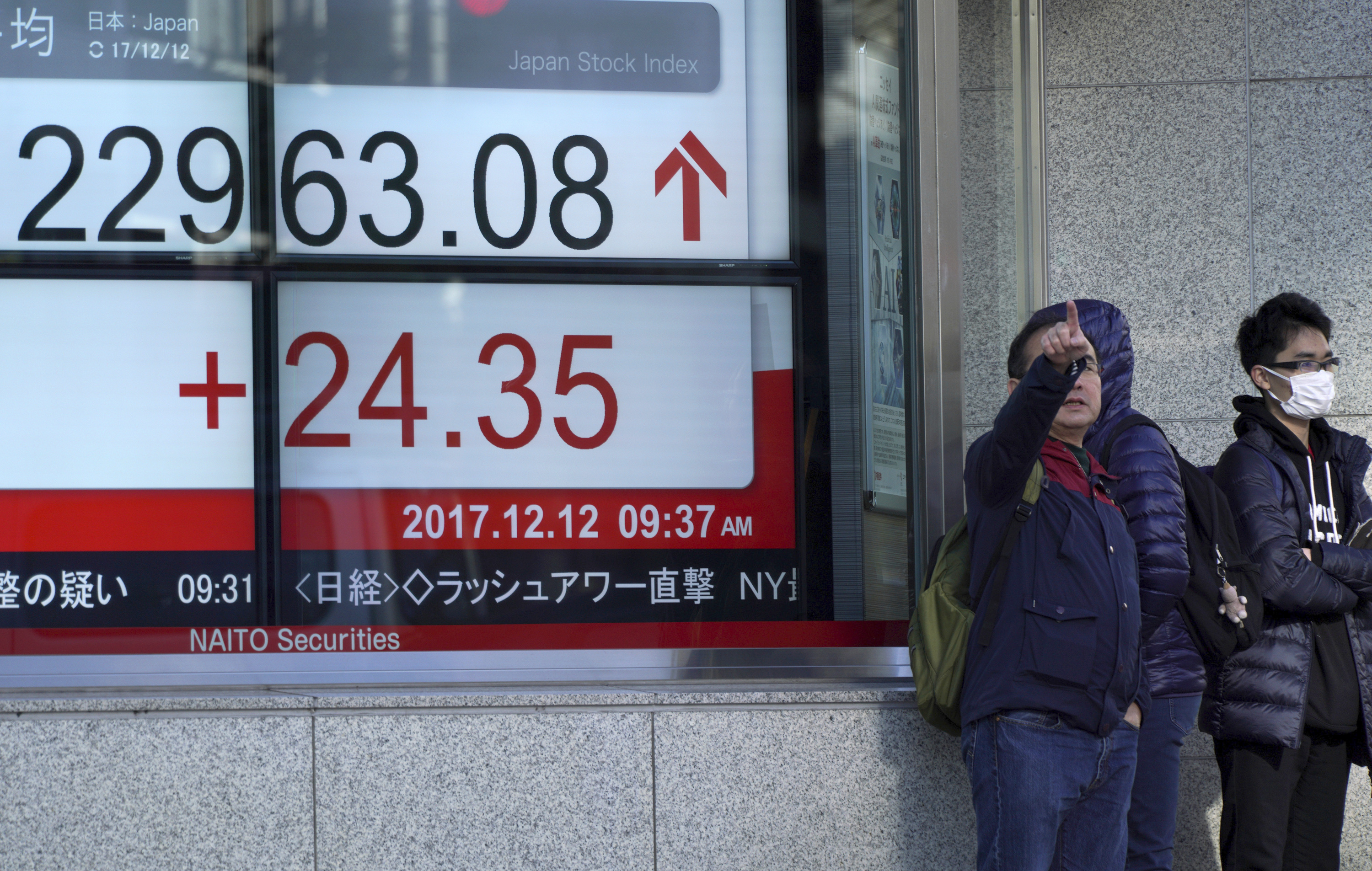 World stocks turn higher as investors eye Fed decision