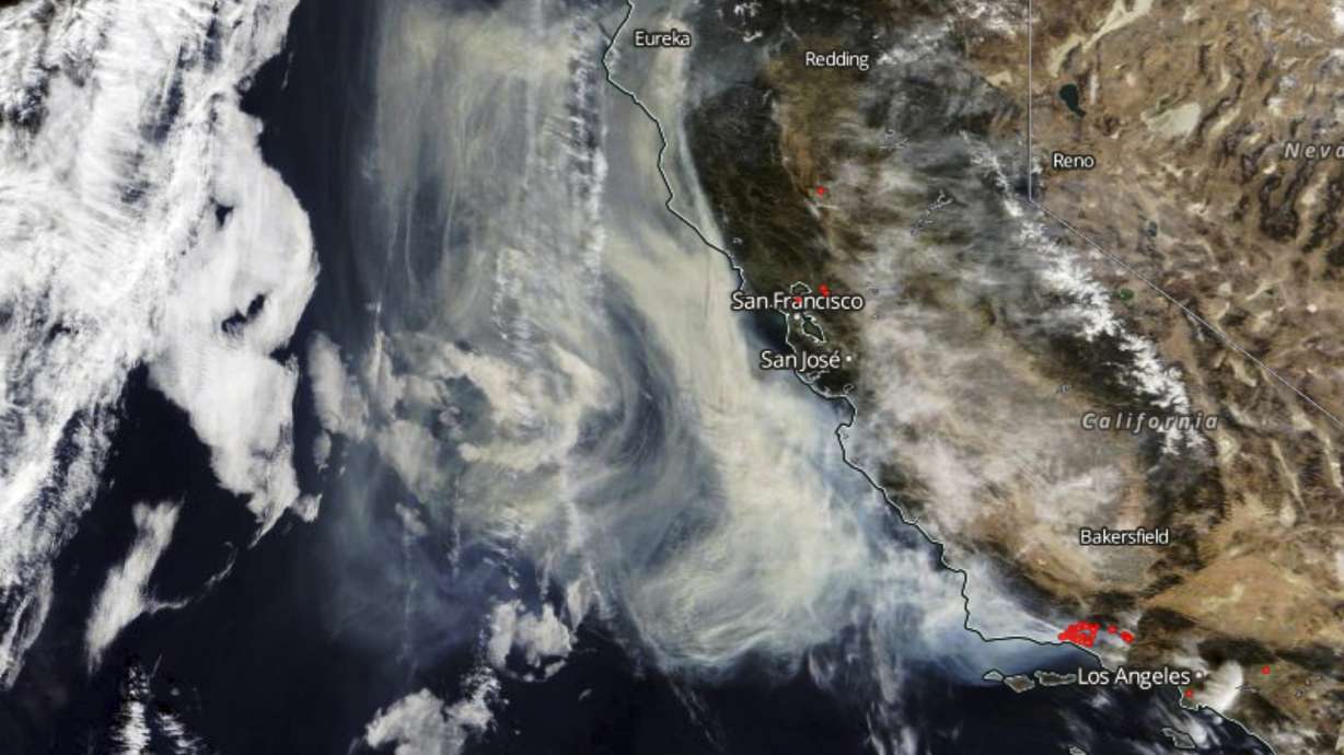 The Latest: Homeless camp fire sparked Los Angeles blaze