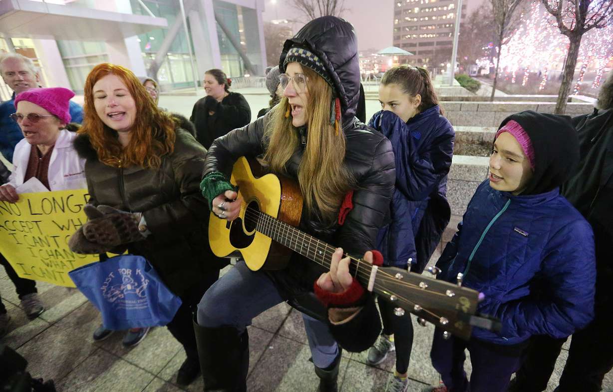 Karen Nielsen plays guitar as Jewish Action Utah holds a rally for Children’s Health Insurance Program funding at the Wallace F. Bennett Federal Building in Salt Lake City on Tuesday, Dec. 12, 2017. (Photo: Jeffrey D. Allred, KSL)