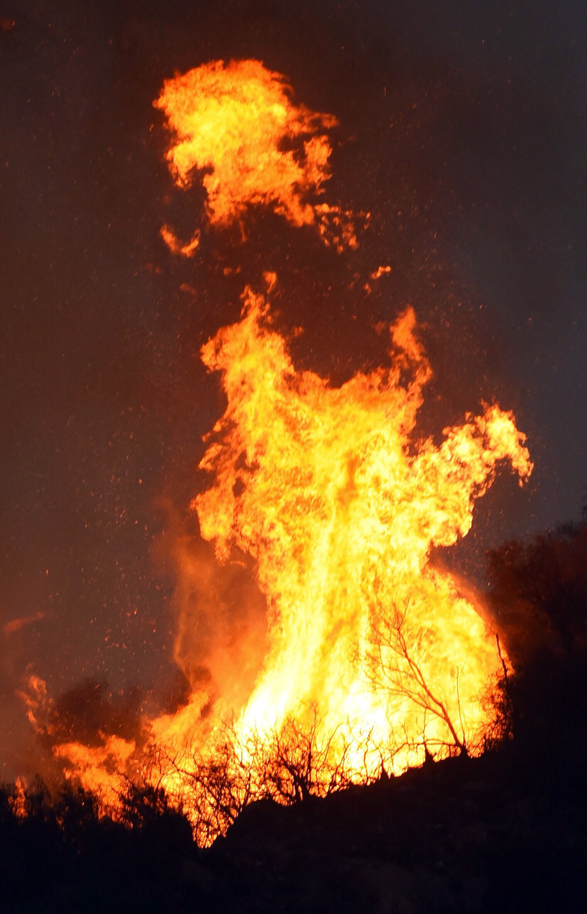 Firefighters wary despite gains against California fire