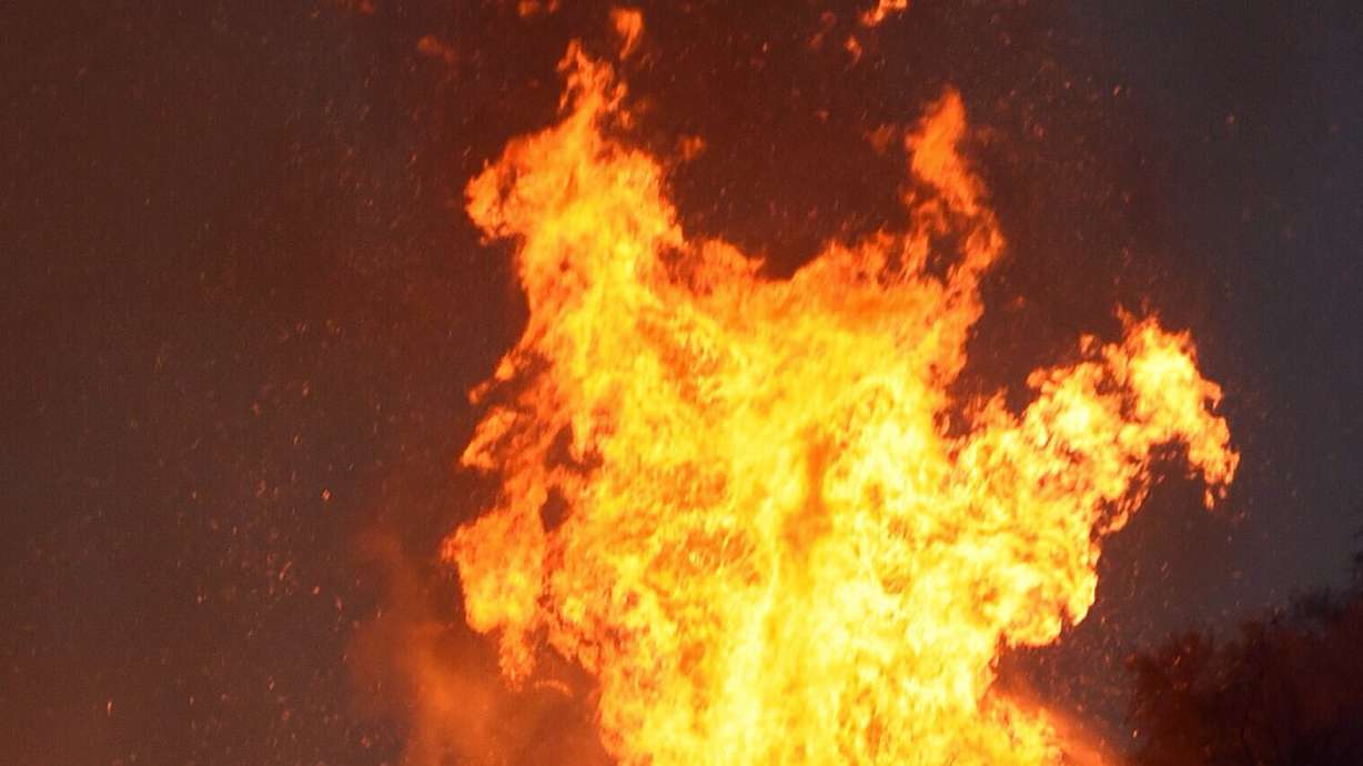 Firefighters wary despite gains against California fire
