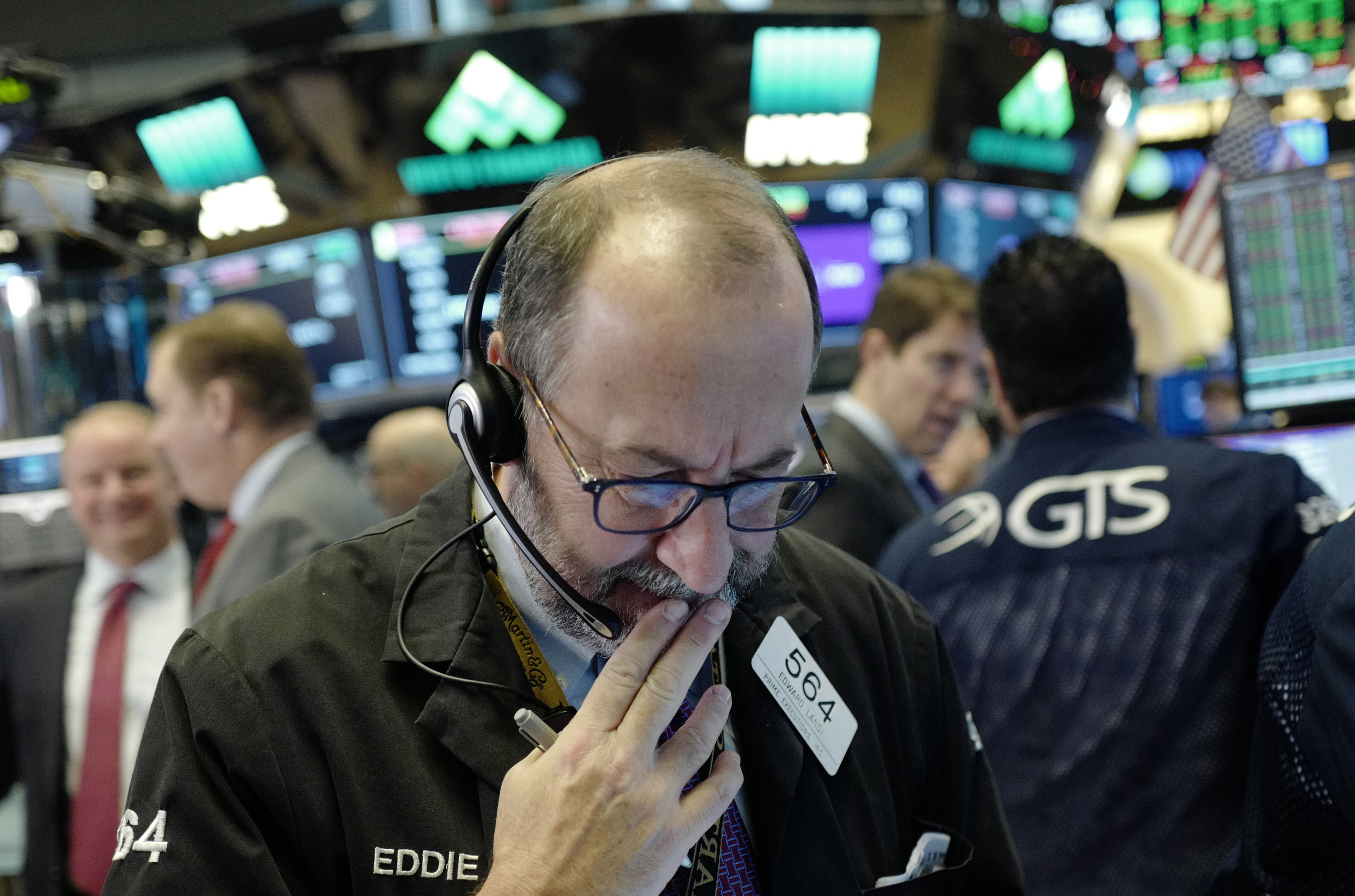 Asian shares mixed as Fed hike gives investors few surprises