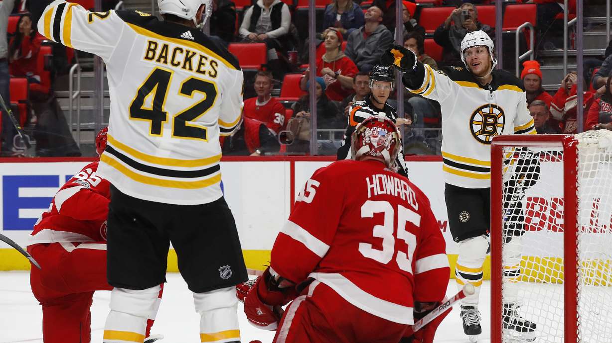 Bruins tie it late, beat Red Wings 3-2 in OT behind Marchand
