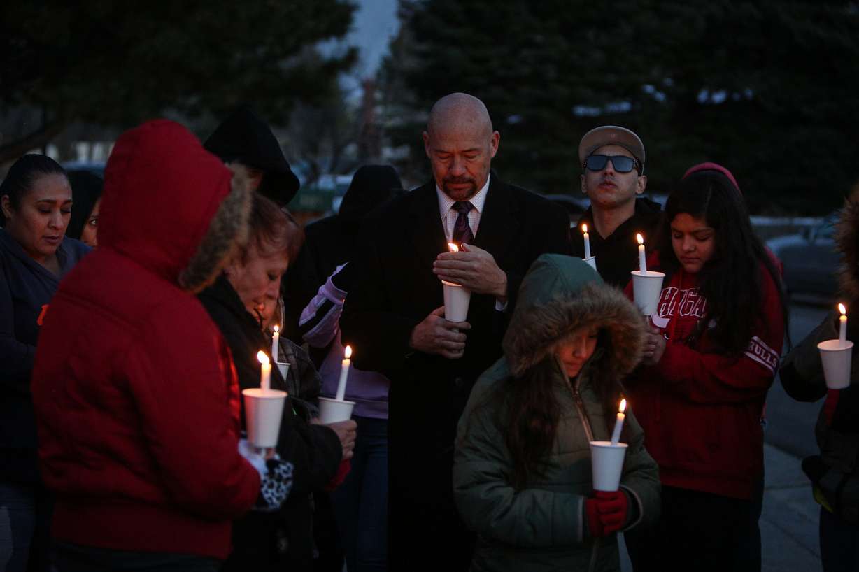 Friends and family remember Alice Griego and Ralph Salazar at a vigil for them in Sandy on Thursday, Dec. 14, 2017. Five years ago Griego and Salazar were shot and killed inside their home on Salt Lake County's east bench and then set on fire. (Photo: Adam Fondren, KSL)