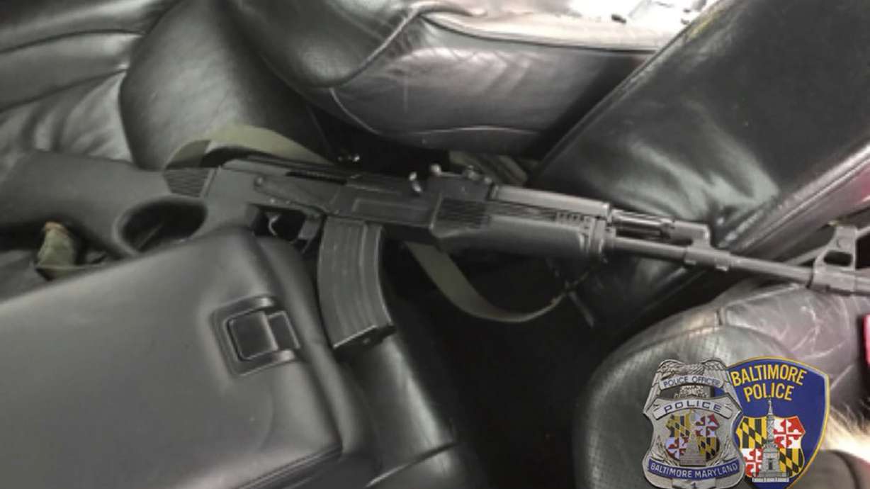 Gunman fires wildly during car chase through Baltimore