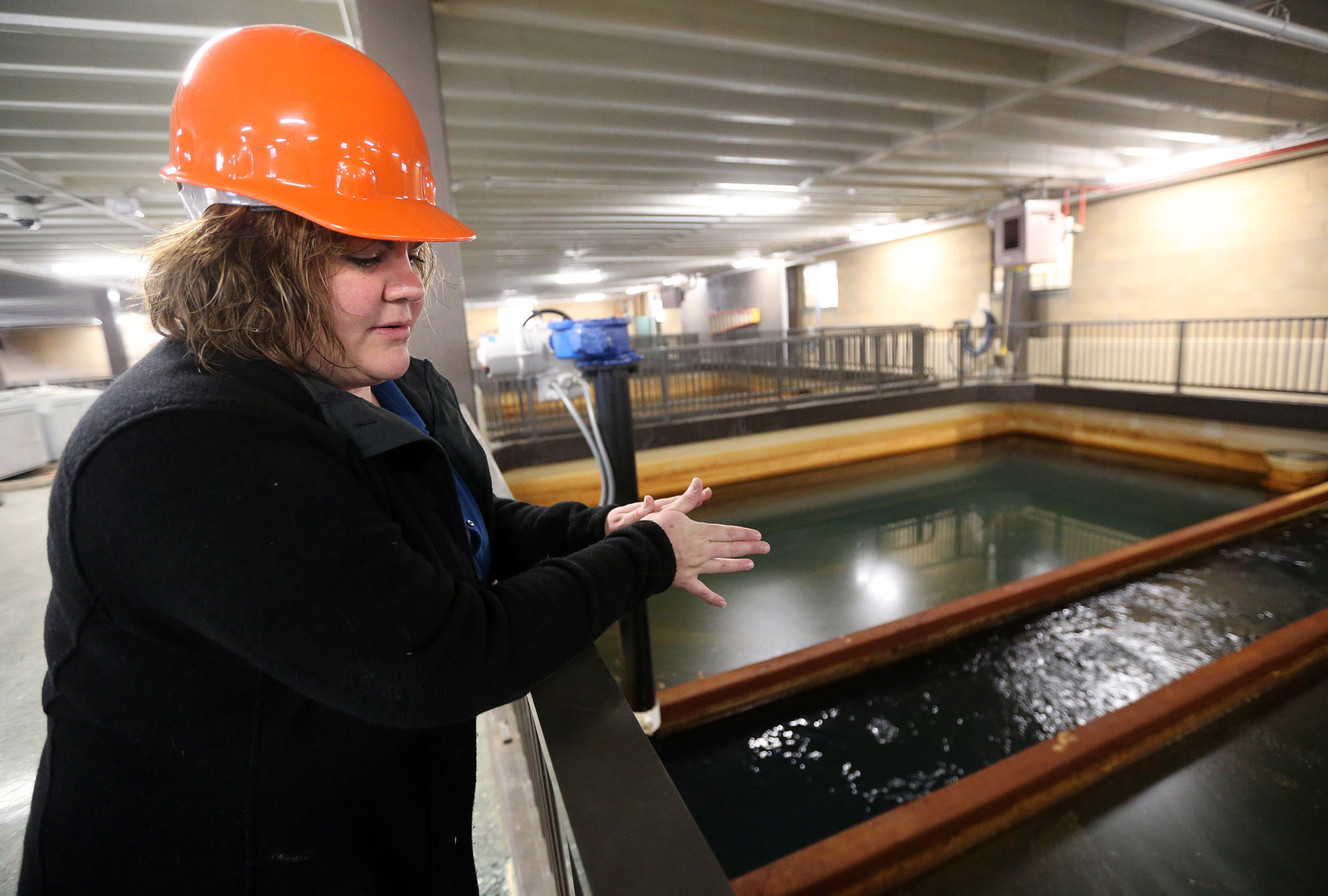 Michelle Barry, water treatment engineer for the Salt Lake City Department of Public Utilities, talks about a byproduct of ferric chloride that causes a film on top of the water during the filtration stage at the Big Cottonwood Water Treatment Plant in Cottonwood Heights on Thursday, Dec. 14, 2017. (Photo: Kristin Murphy, KSL)