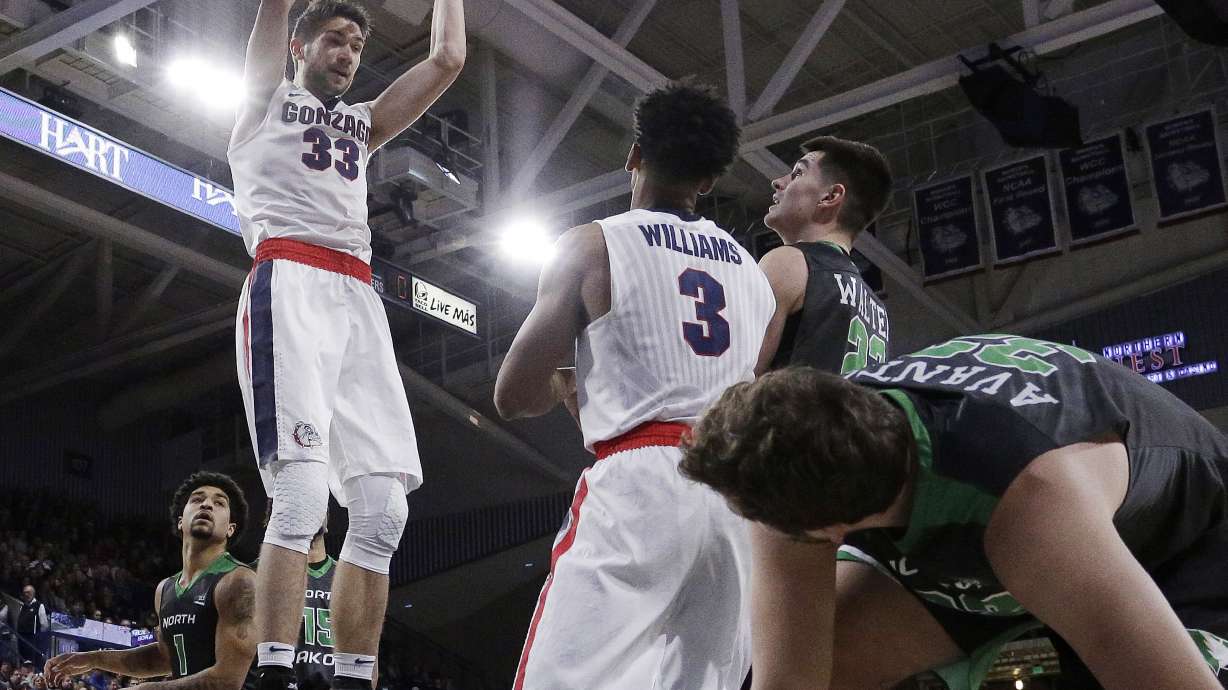 Perkins leads No. 12 Gonzaga over North Dakota 89-83 in OT