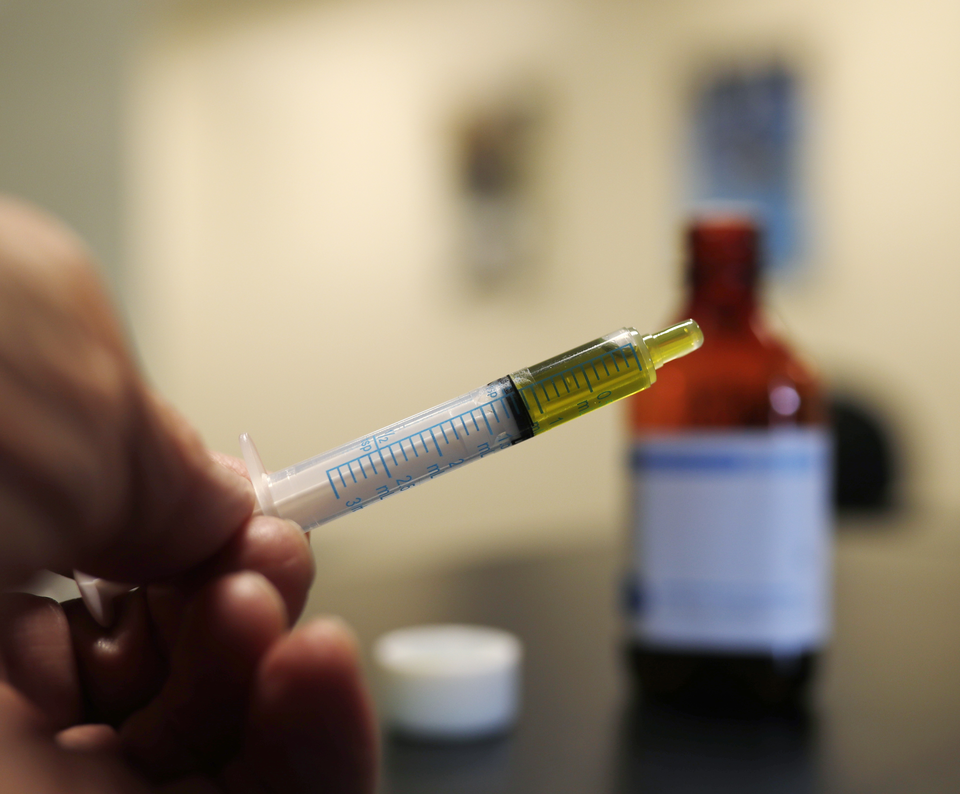 Business owner, Idaho town clash over pot extract's legality