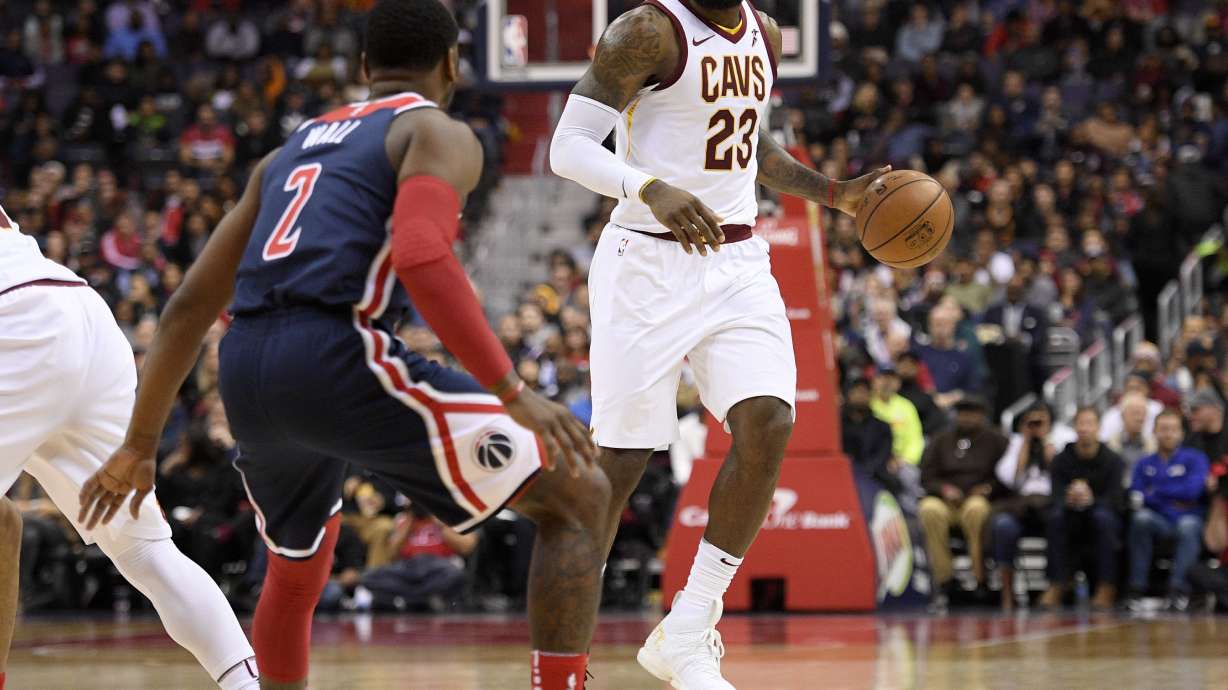 In special shoes, LeBron's triple-double leads Cavs past Wiz