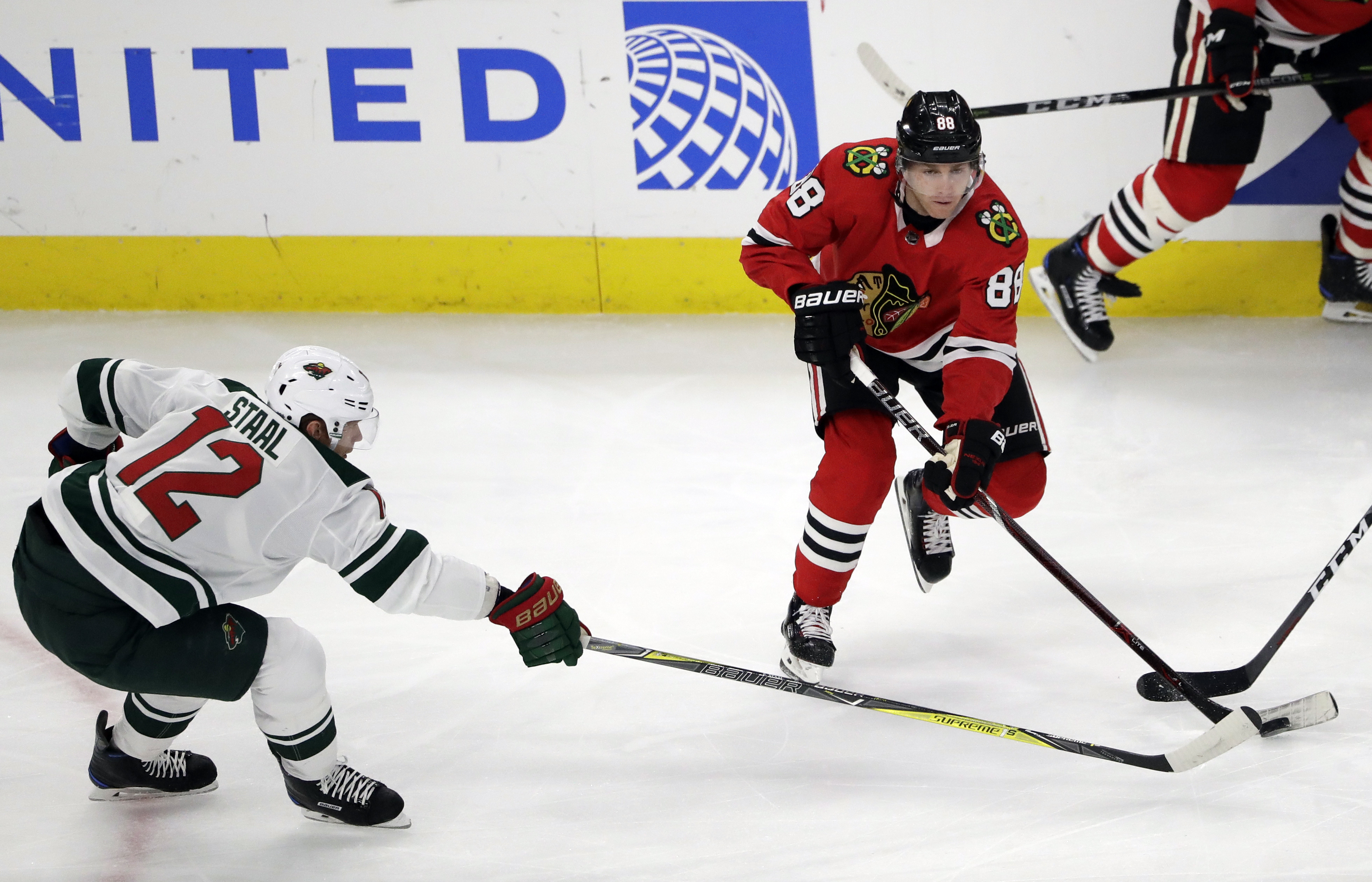 Kane, Crawford lead Blackhawks past Wild for 5th straight