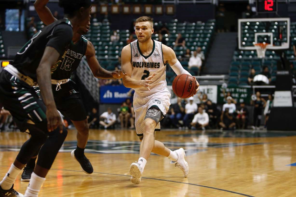 Utah Valley redshirt-sophomore wing Jake Toolson during a game against Hawai'i, Dec. 17, 2017 in Honolulu. "We learned a lot in the non-conference, playing really good teams," said Toolson, whose team rides a seven-game win streak into next week's WAC road trip to UT Rio Grande Valley and New Mexico State. (Courtesy photo: UVU Athletics)