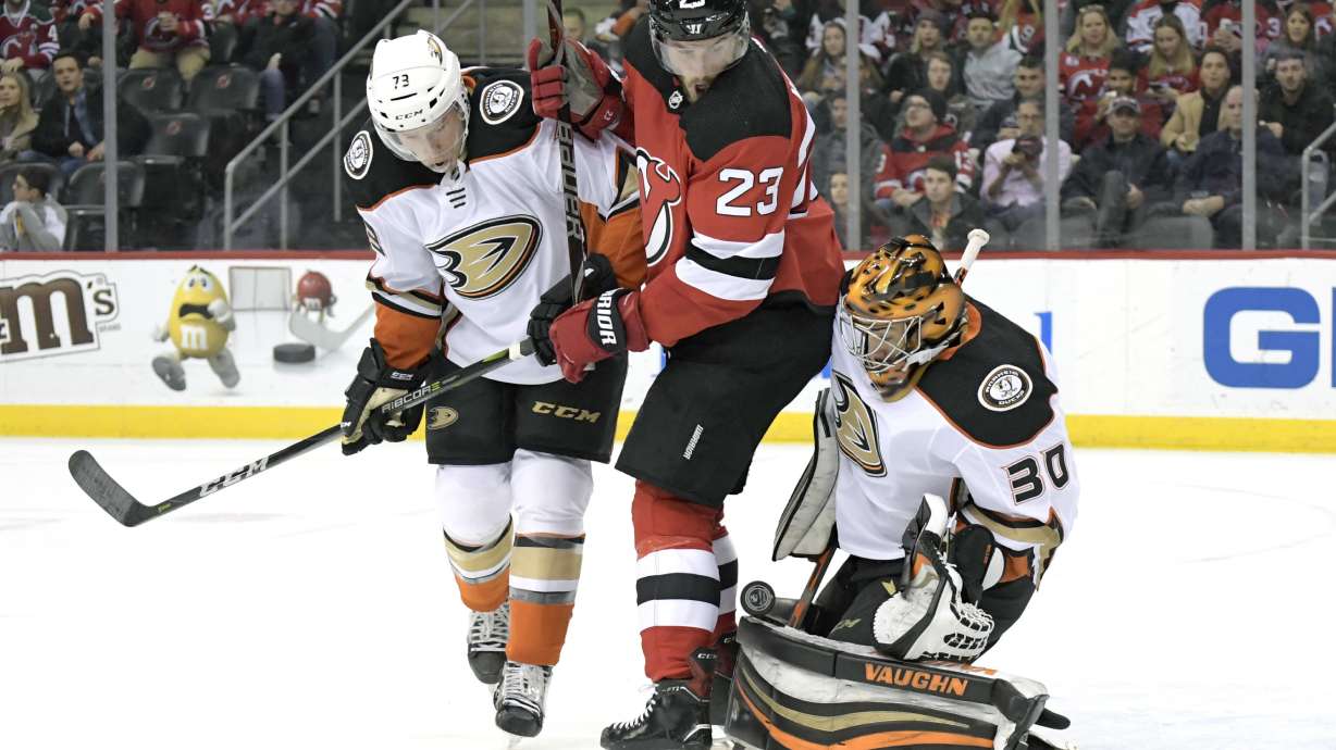 Noesen scores 2 late goals as Devils rally to beat Ducks