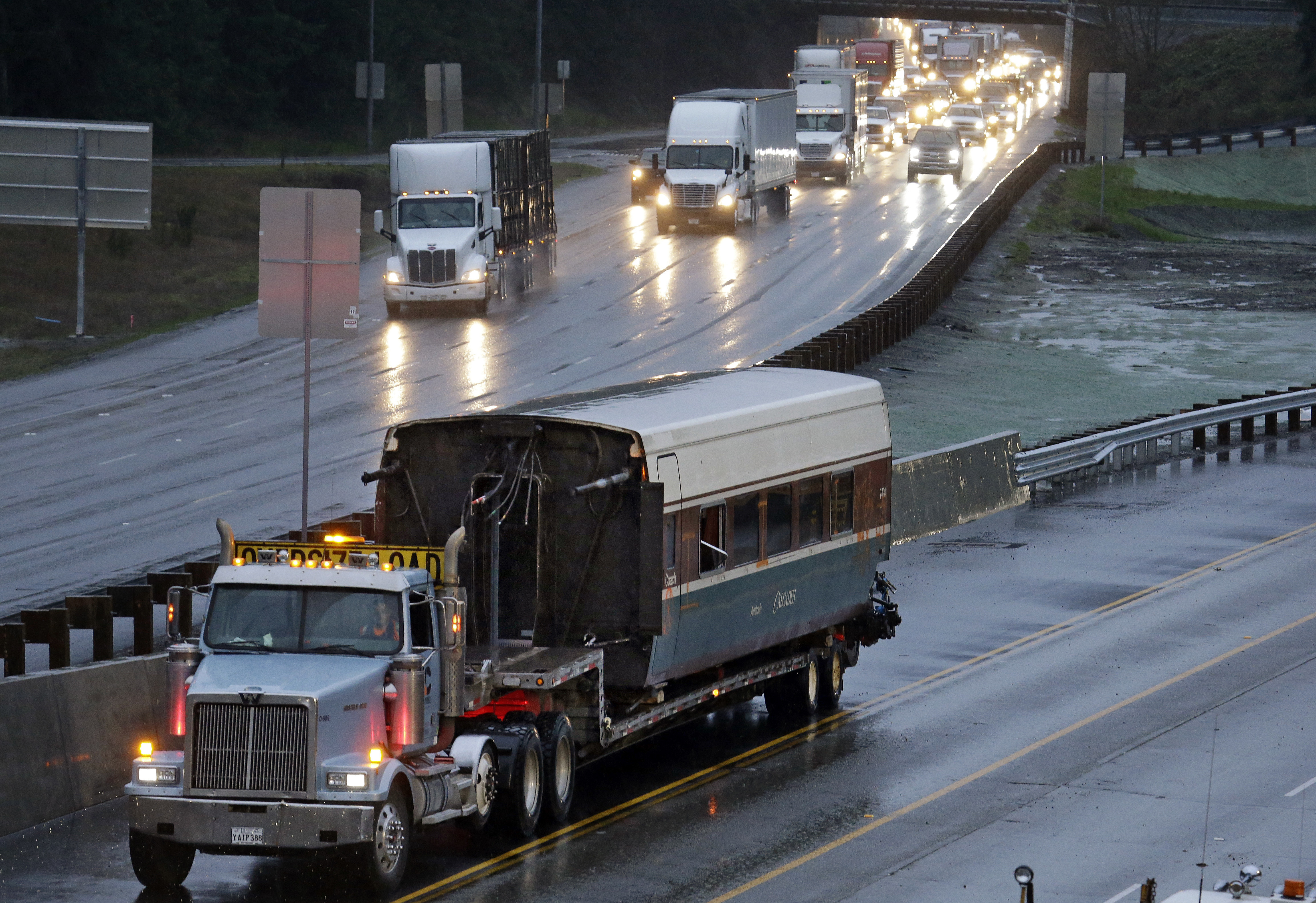 The Latest: Amtrak speed-control technology was months away