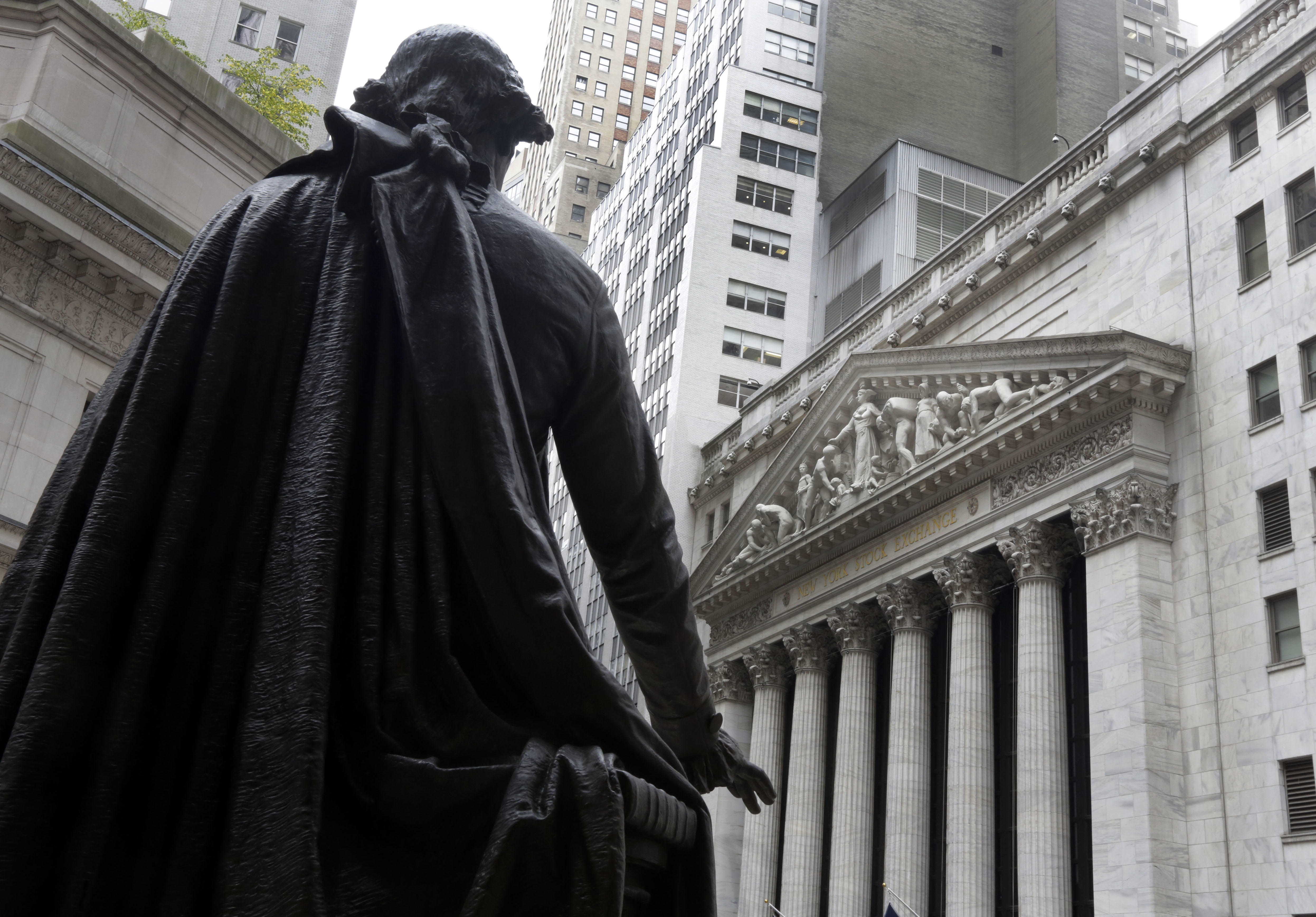 Most Asian shares lower as US tax passage fails to impress