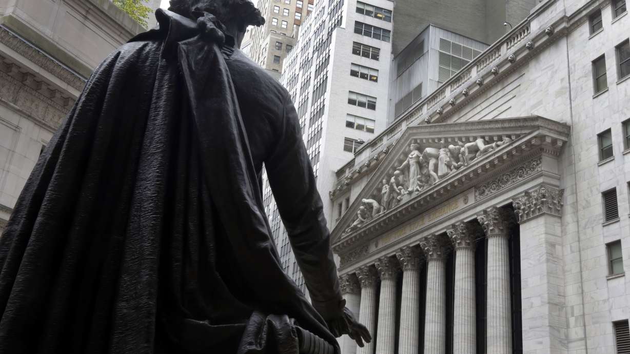 Most Asian shares lower as US tax passage fails to impress