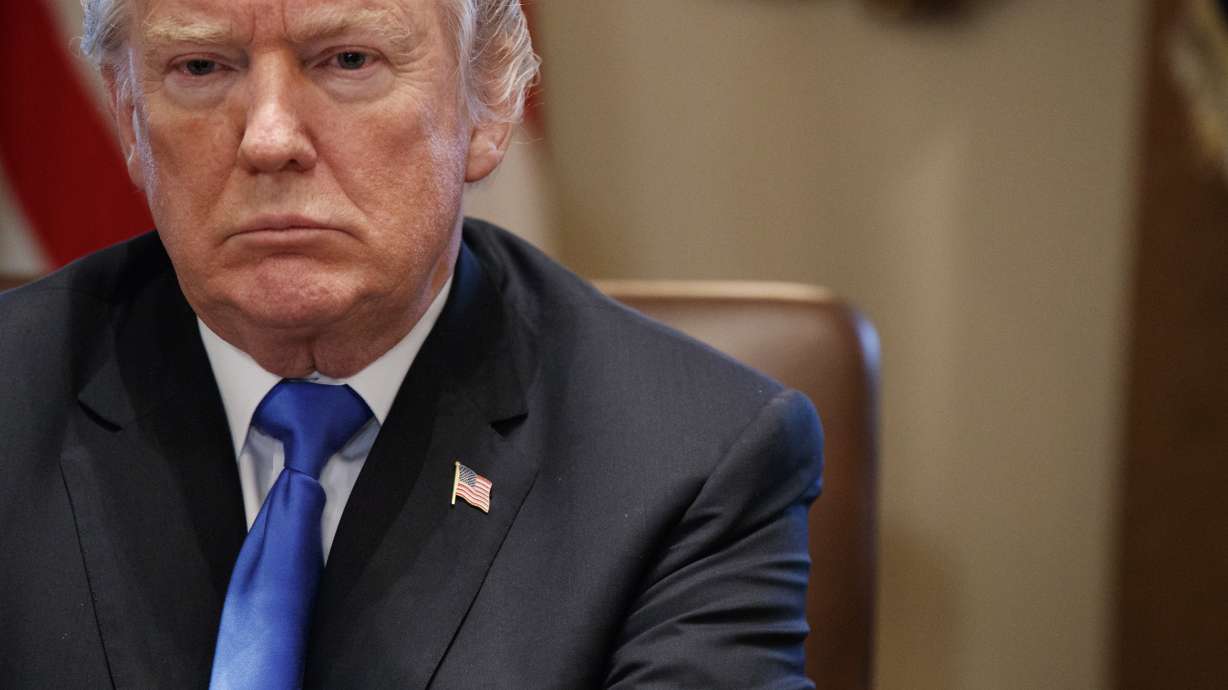 AP FACT CHECK: Trump says 'Obamacare' is repealed. It isn't.