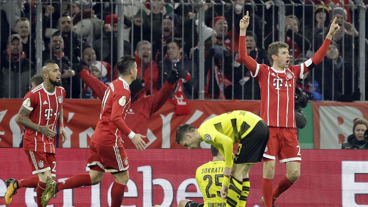 Bayern beats defending champ Dortmund 2-1 in German Cup