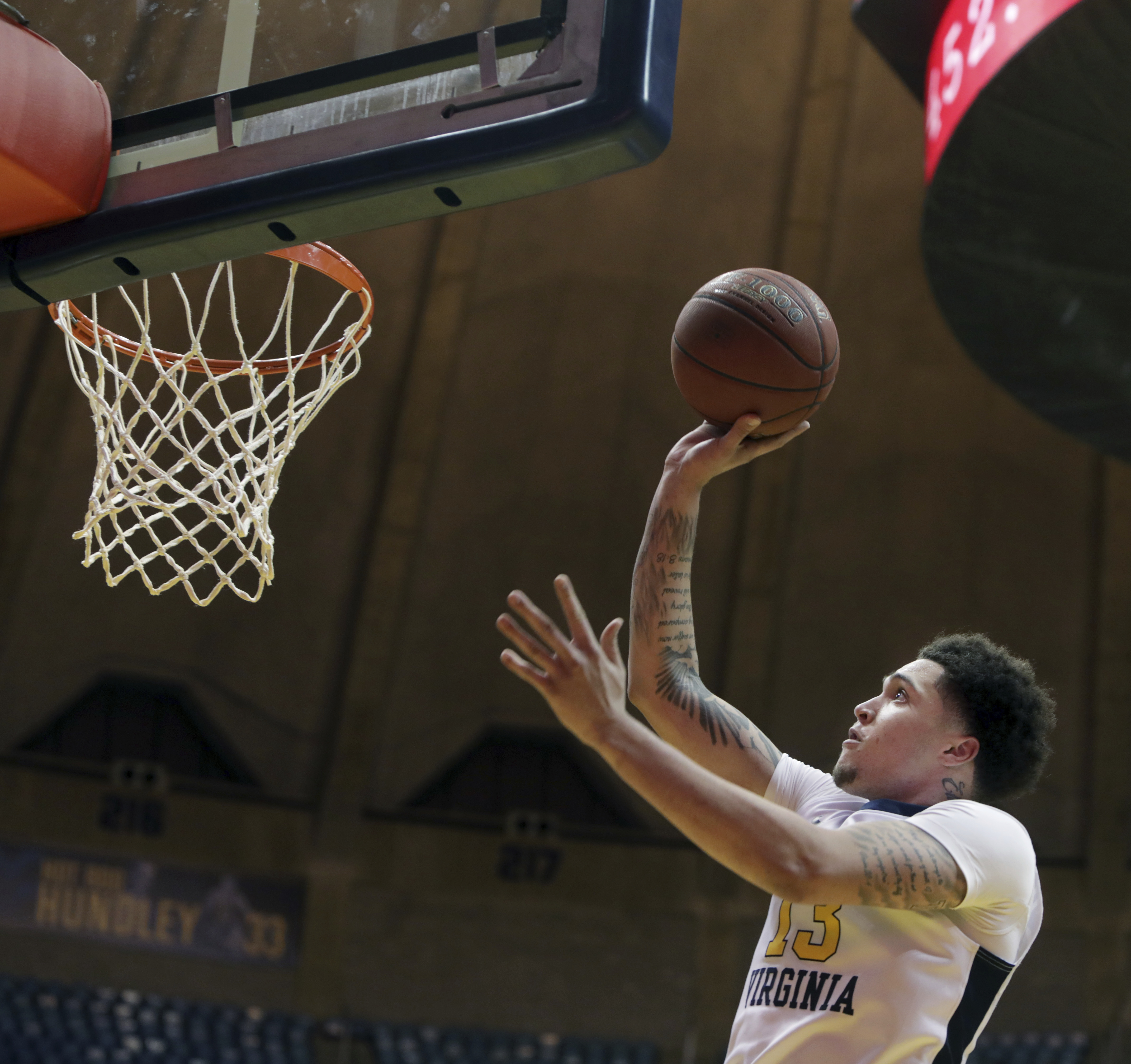 Allen leads No. 10 WVU over Coppin State 77-38