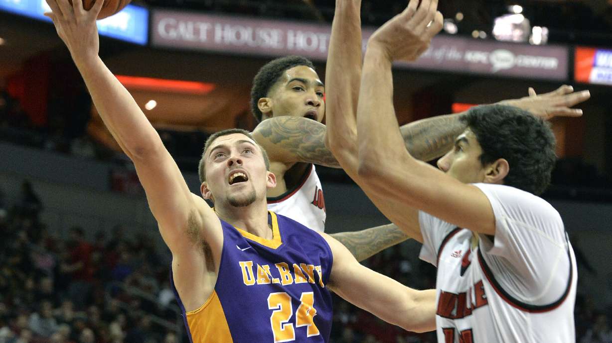 Spalding's jumper lifts Louisville past Albany 70-68