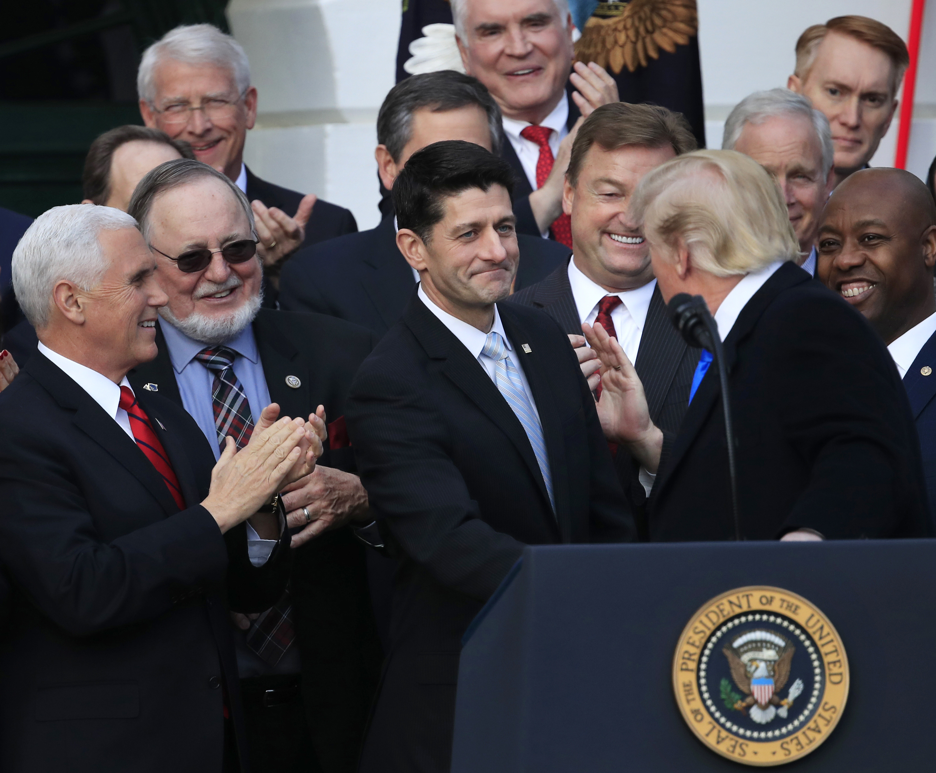 The Latest: House narrowly passes short-term spending bill