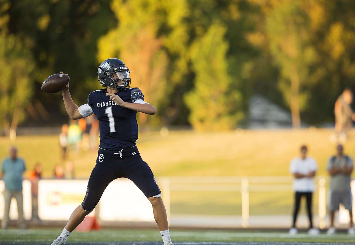 Zach Wilson (1) passes the ball as Skyridge and Corner Canyon High Schools face off in the Corner Canyon Homecoming game in Draper, Friday, Sept. 16, 2016.