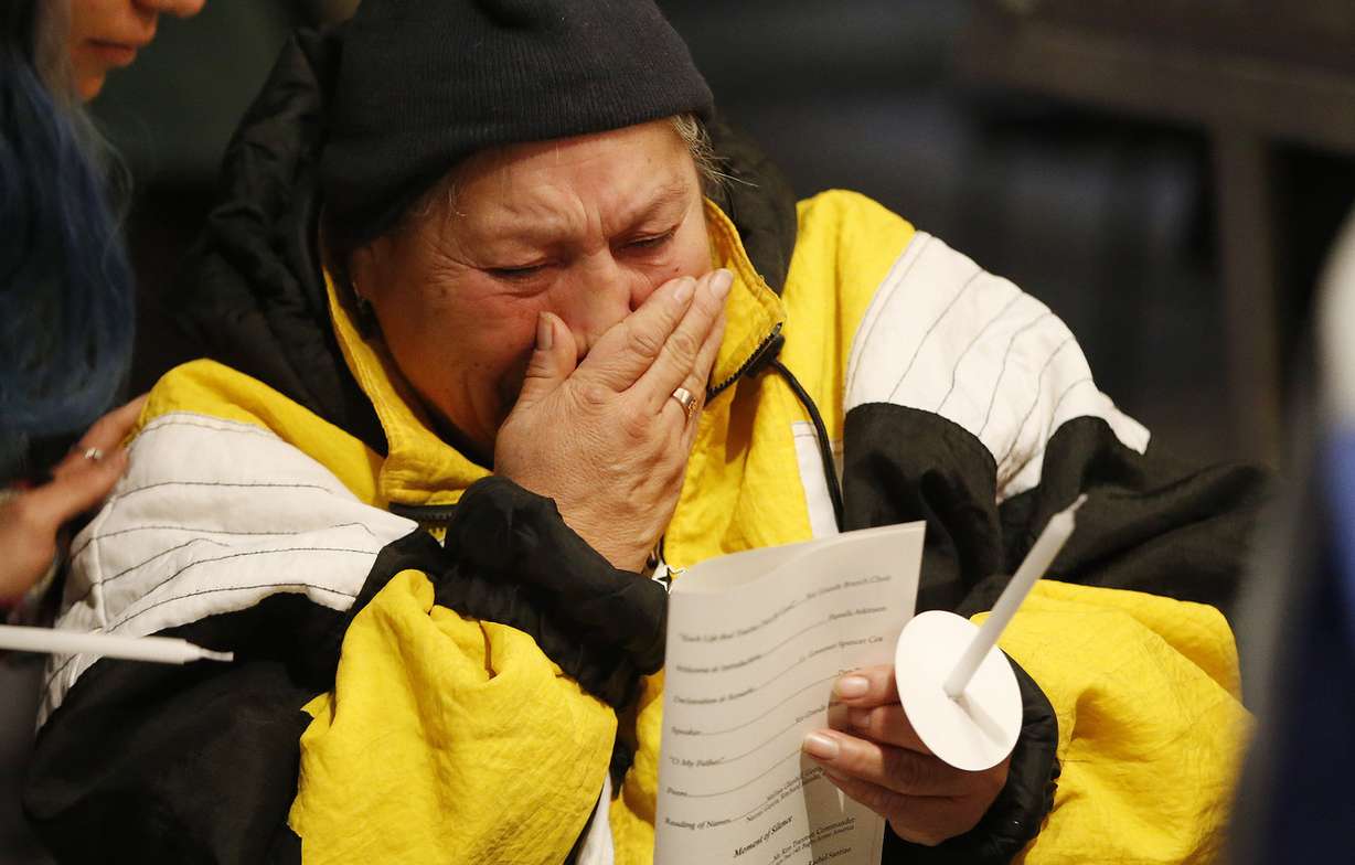 Rosalind Shorty cries for her husband, who died in March, during the Homeless Persons Memorial at Pioneer Park in Salt Lake City on Thursday, Dec. 21, 2017. (Photo: Jeffrey D. Allred, KSL)