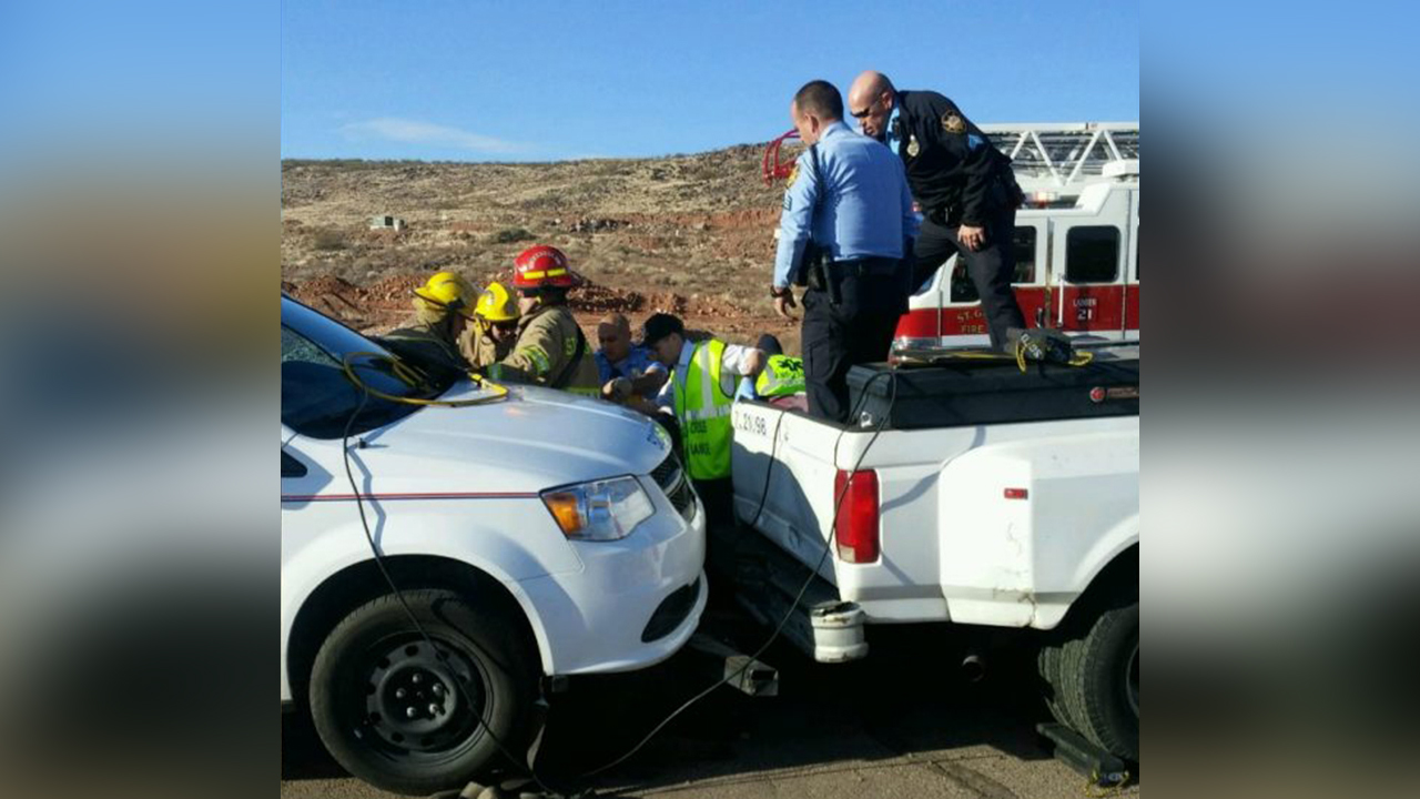 Strangers step in to help man crushed between 2 vehicles