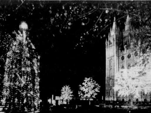 A photo from a practice run of Temple Square lights that was published in the Dec. 8, 1965 edition of the Deseret News. The first ever public display of Christmas lights at Temple Square was held the following night. (Photo: Deseret News Archives)