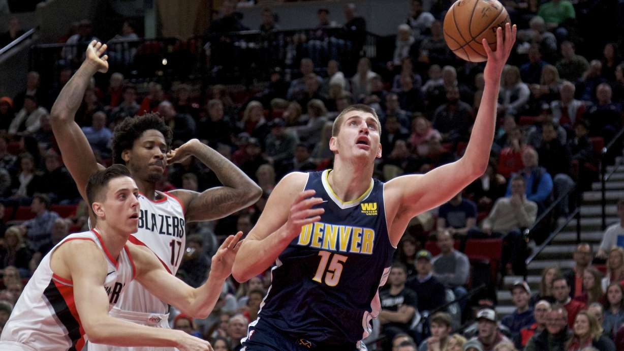 Jokic leads Nuggets to first win in Portland since 2013