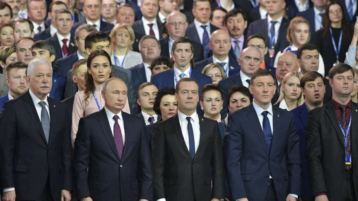 Putin vows to modernize Russia, challengers prepare for race