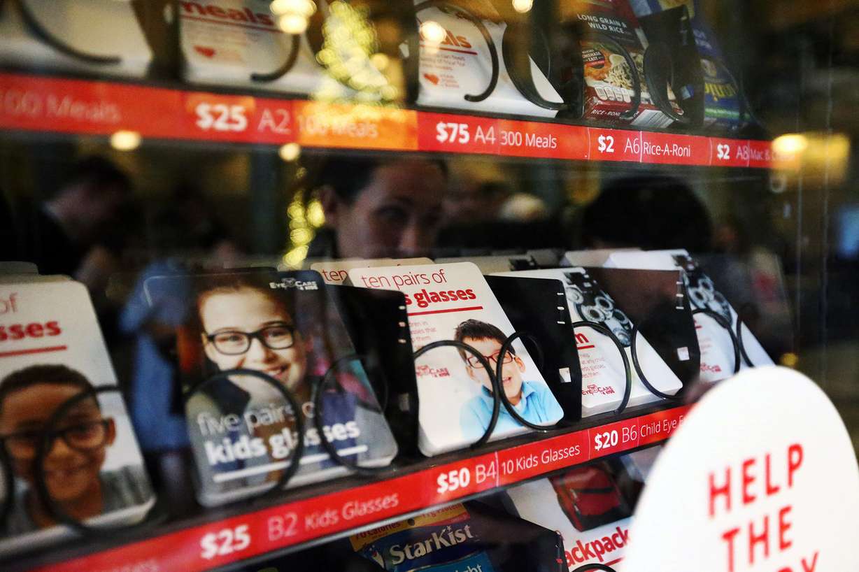 Selections for donation are listed inside one of the charity vending machines at the Joseph Smith Memorial Building in Salt Lake City on Friday, Dec. 15, 2017. (Photo: Scott G Winterton, KSL)