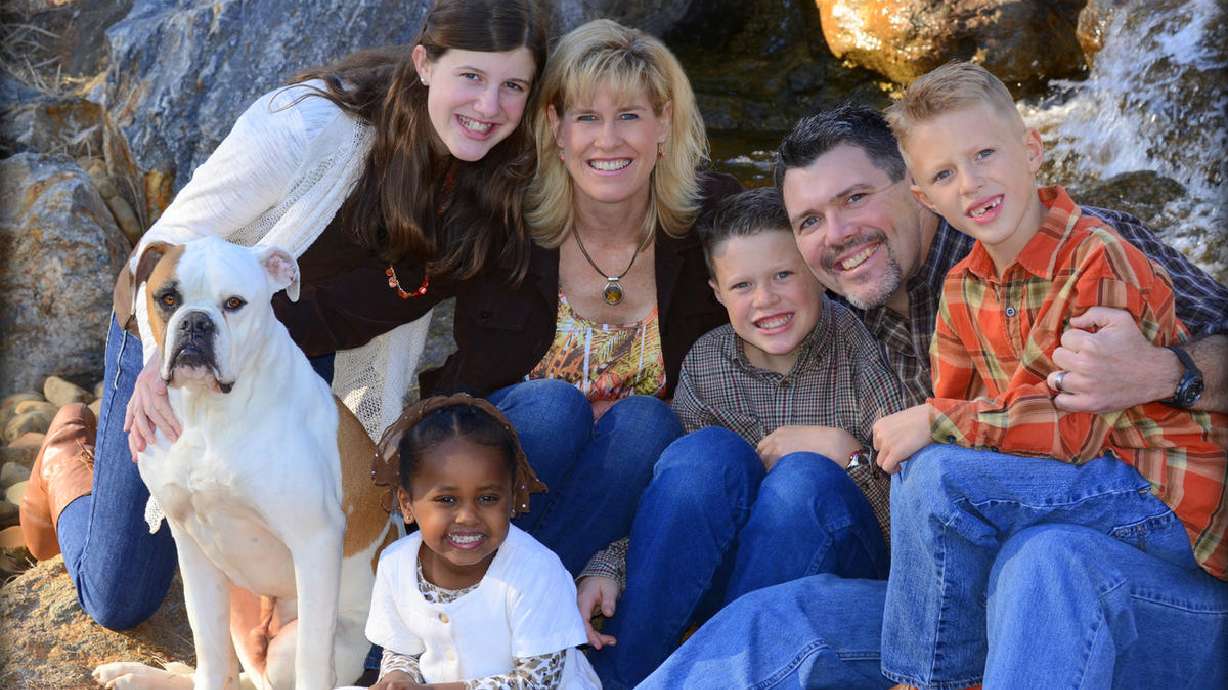 BYU's Jeff Grimes: A sweet adoption story and an Andy Reid connection