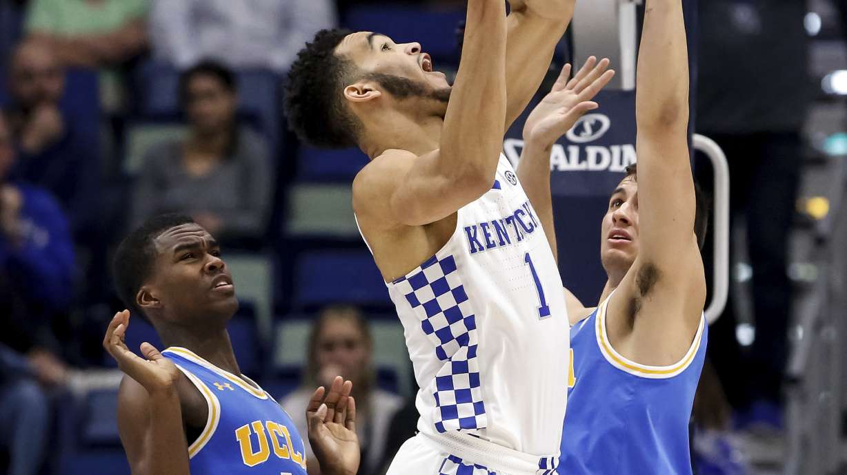 Holiday, Wilkes, lead UCLA to upset of No. 7 Kentucky, 83-75
